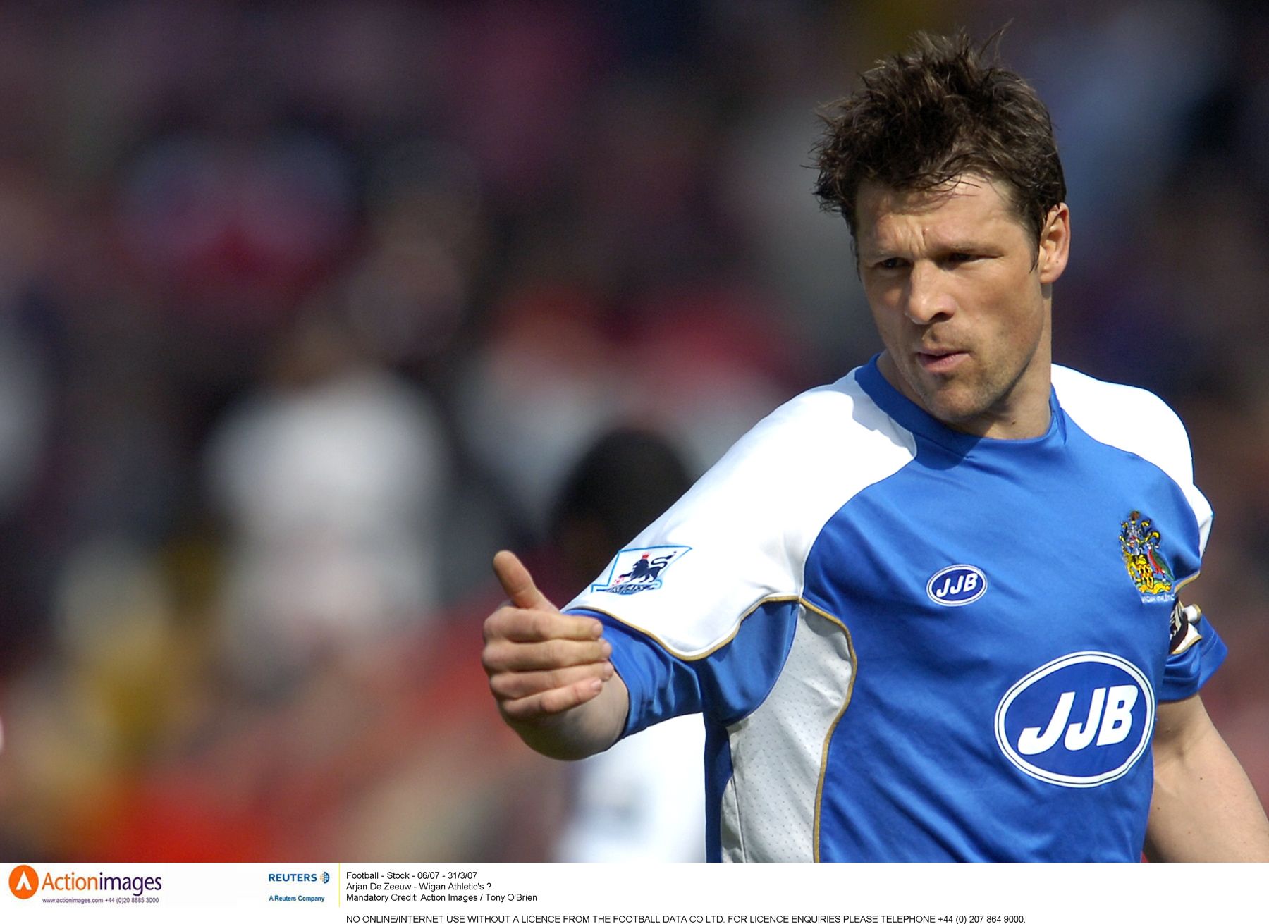 Football - Stock - 06/07 - 31/3/07 
Arjan De Zeeuw - Wigan Athletic's ? 
Mandatory Credit: Action Images / Tony O'Brien 
NO ONLINE/INTERNET USE WITHOUT A LICENCE FROM THE FOOTBALL DATA CO LTD. FOR LICENCE ENQUIRIES PLEASE TELEPHONE +44 (0) 207 864 9000.