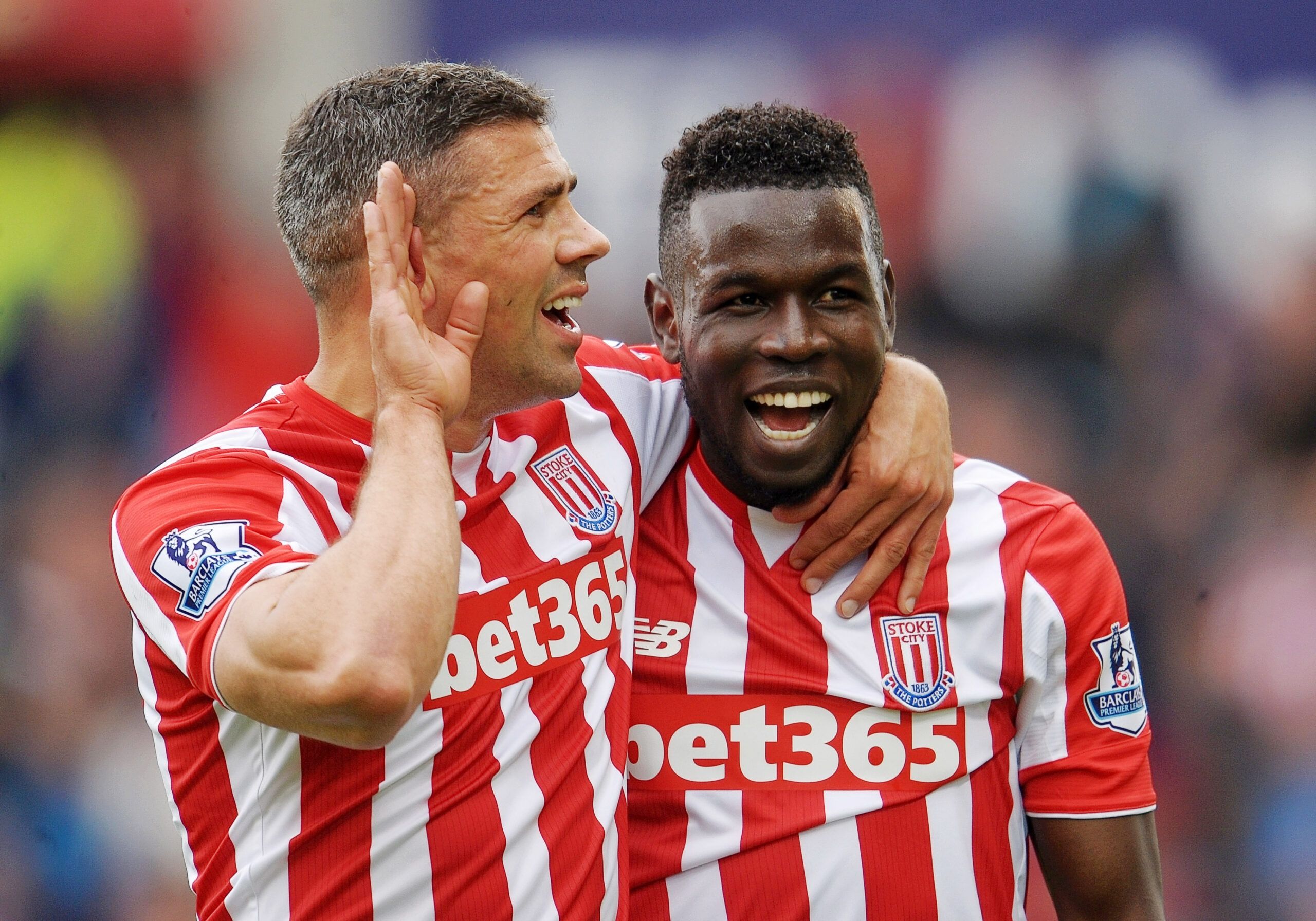 Football - Stoke City v Liverpool - Barclays Premier League - Britannia Stadium - 24/5/15 
Stoke City's Mame Biram Diouf celebrates scoring their first goal with Jonathan Walters 
Action Images via Reuters / Paul Burrows 
Livepic 
EDITORIAL USE ONLY. No use with unauthorized audio, video, data, fixture lists, club/league logos or 