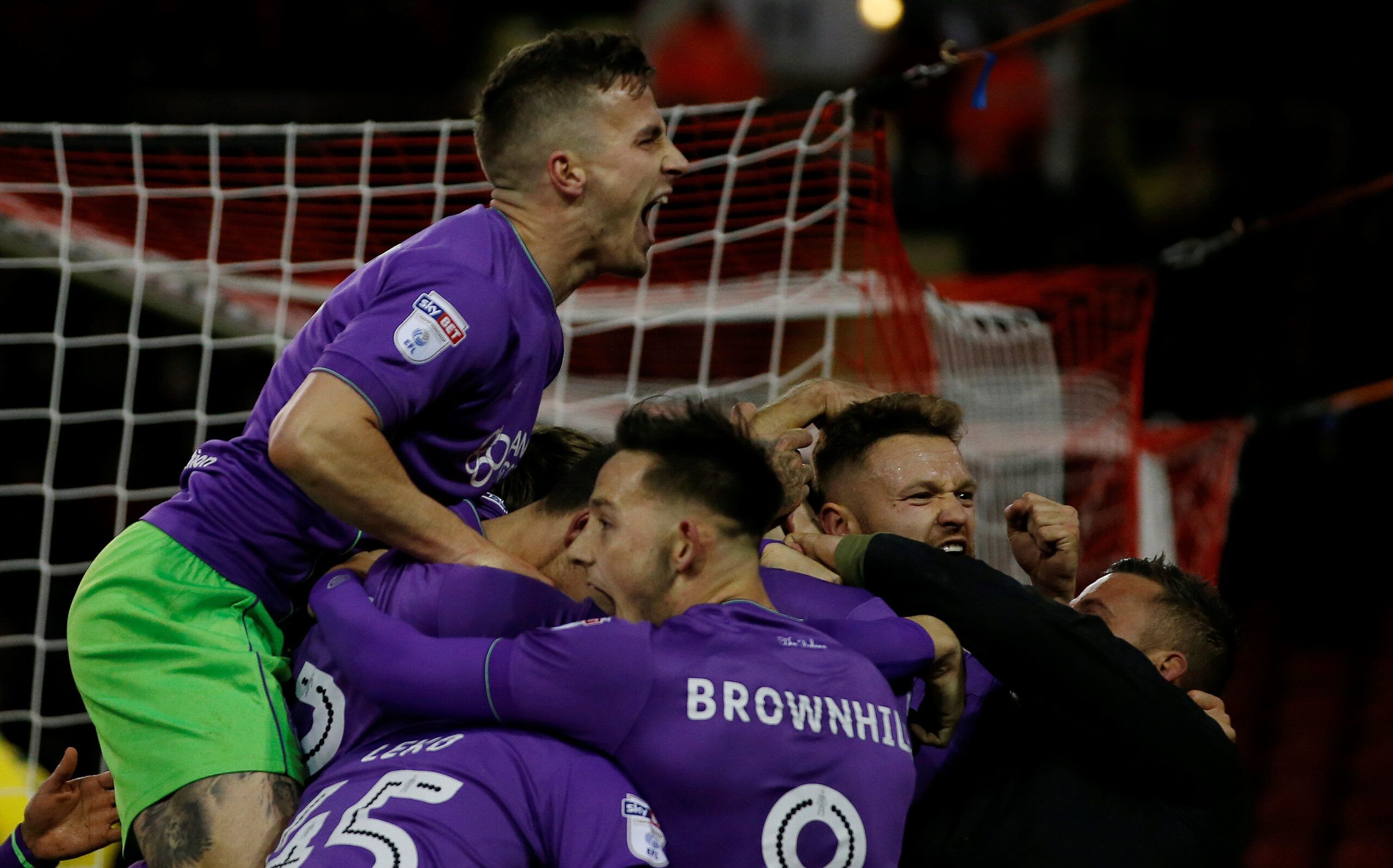 Soccer Football - Championship - Sheffield United vs Bristol City - Bramall Lane, Sheffield, Britain - December 8, 2017   Bristol City's Aden Flint (hidden) celebrates scoring their second goal with teammates   Action Images/Craig Brough    EDITORIAL USE ONLY. No use with unauthorized audio, video, data, fixture lists, club/league logos or 