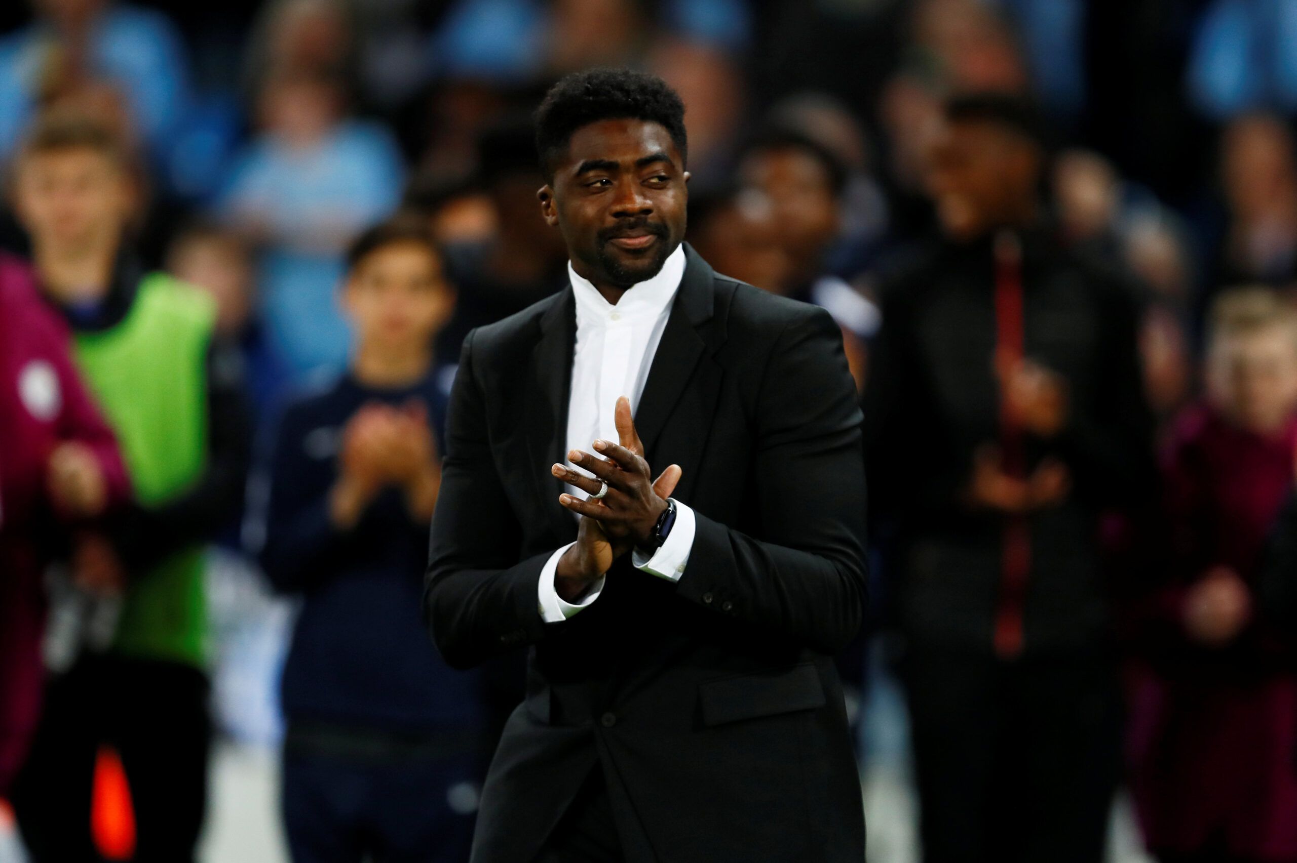 Soccer Football - Premier League - Manchester City v Brighton &amp; Hove Albion - Etihad Stadium, Manchester, Britain - May 9, 2018   Kolo Toure applauds during a ceremony after the match                       Action Images via Reuters/Jason Cairnduff    EDITORIAL USE ONLY. No use with unauthorized audio, video, data, fixture lists, club/league logos or 