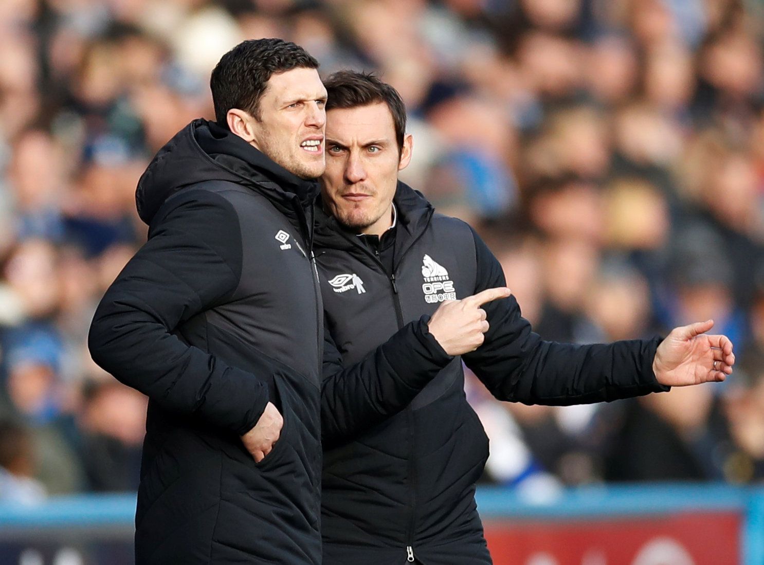 Soccer Football - Premier League - Huddersfield Town v Manchester City - John Smith's Stadium, Huddersfield, Britain - January 20, 2019  Huddersfield Town caretaker manager Mark Hudson and assistant coach Dean Whitehead during the match   Action Images via Reuters/Carl Recine  EDITORIAL USE ONLY. No use with unauthorized audio, video, data, fixture lists, club/league logos or 