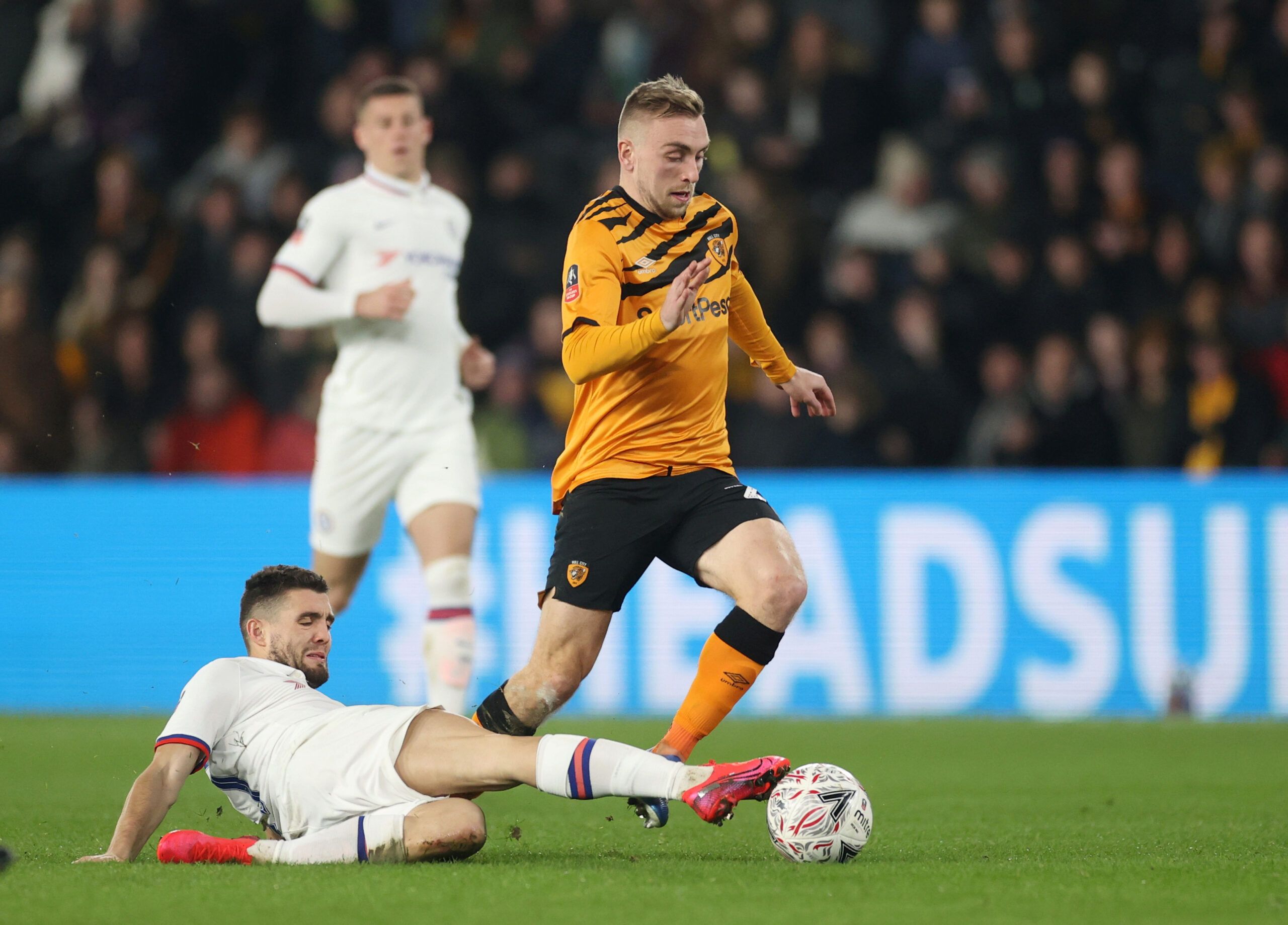 Soccer Football - FA Cup Fourth Round - Hull City v Chelsea - KCOM Stadium, Hull, Britain - January 25, 2020  Chelsea's Mateo Kovacic fouls Hull City's Jarrod Bowen and is subsequently shown a yellow card by referee Craig Pawson    Action Images via Reuters/Carl Recine