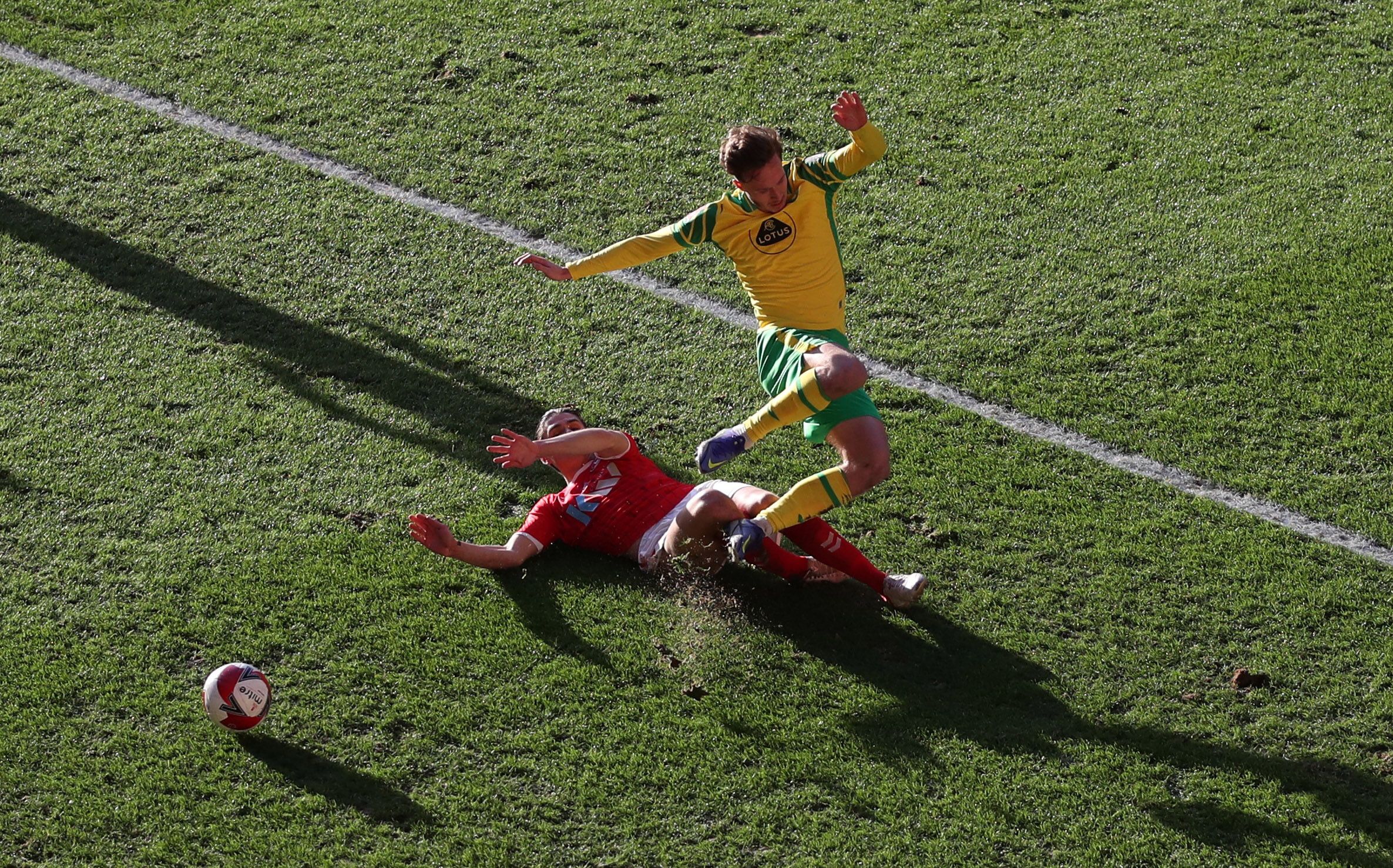 Soccer Football - FA Cup Third Round - Charlton Athletic v Norwich City - The Valley, London, Britain - January 9, 2022 Charlton Athletic's George Dobson in action with Norwich City's Kieran Dowell Action Images via Reuters/Peter Cziborra