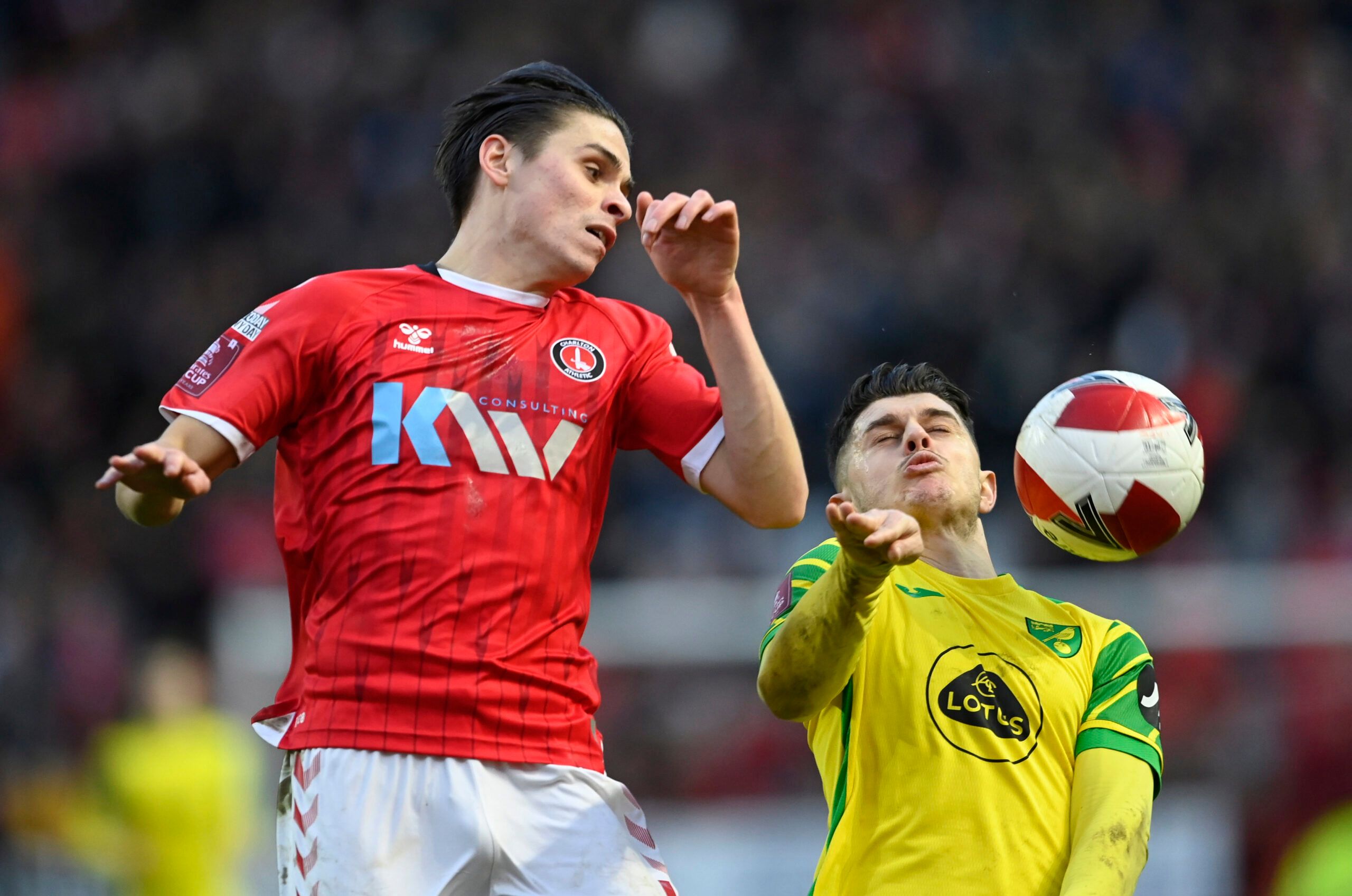 Soccer Football - FA Cup Third Round - Charlton Athletic v Norwich City - The Valley, London, Britain - January 9, 2022 Charlton Athletic's George Dobson in action with Norwich City's Milot Rashica REUTERS/Tony Obrien