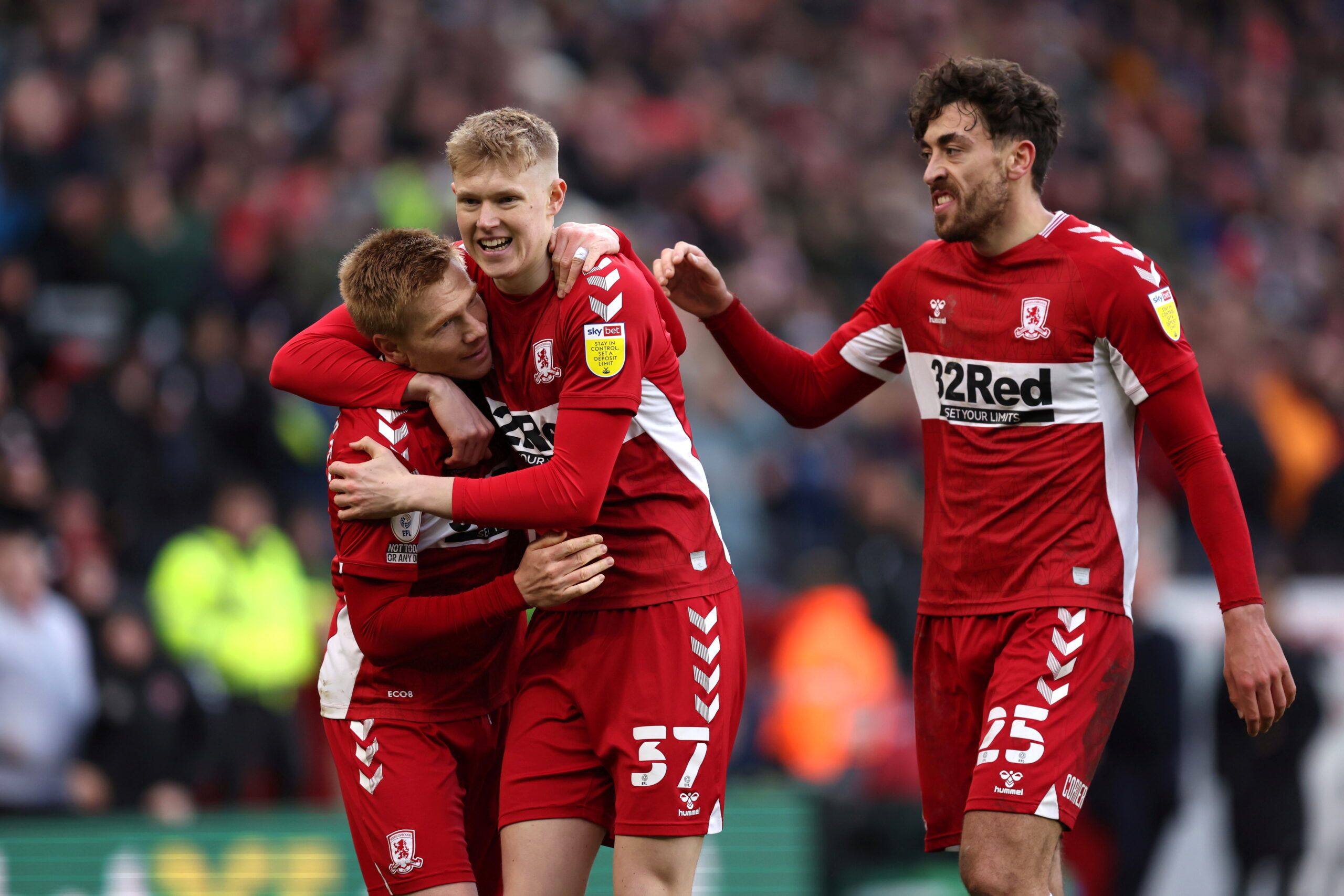 Soccer Football - Championship - Middlesbrough v Luton Town - Riverside Stadium, Middlesbrough, Britain - March 5, 2022  Middlesbrough's Duncan Watmore celebrates scoring their second goal with Josh Coburn and Matt Crooks  Action Images/John Clifton  EDITORIAL USE ONLY. No use with unauthorized audio, video, data, fixture lists, club/league logos or 