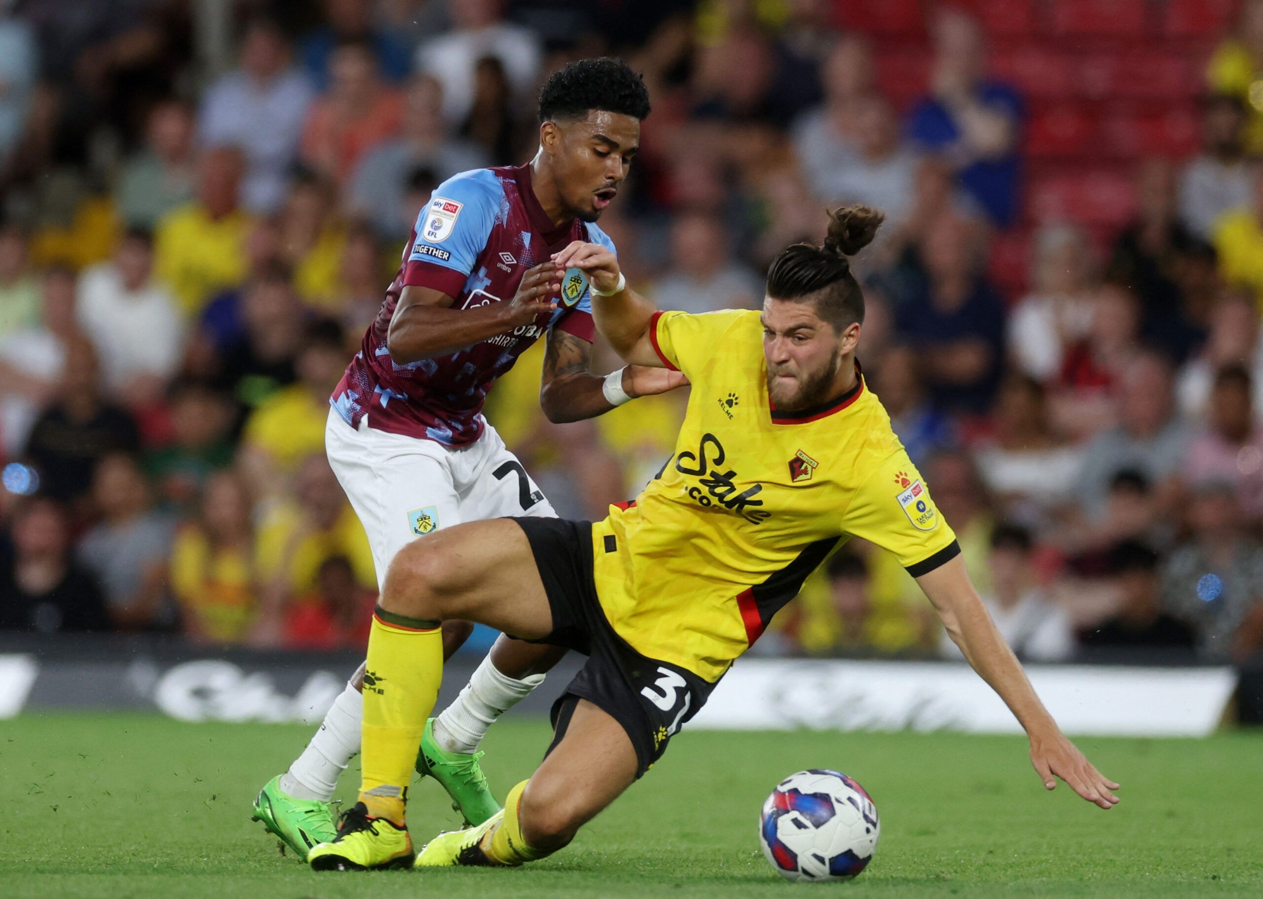 Soccer Football - Championship - Watford v Burnley - Vicarage Road, Watford, Britain - August 12, 2022 Watford's Francisco Sierralta in action with Burnley's Ian Maatsen Action Images/Paul Childs EDITORIAL USE ONLY. No use with unauthorized audio, video, data, fixture lists, club/league logos or 'live' services. Online in-match use limited to 75 images, no video emulation. No use in betting, games or single club /league/player publications.  Please contact your account representative for further