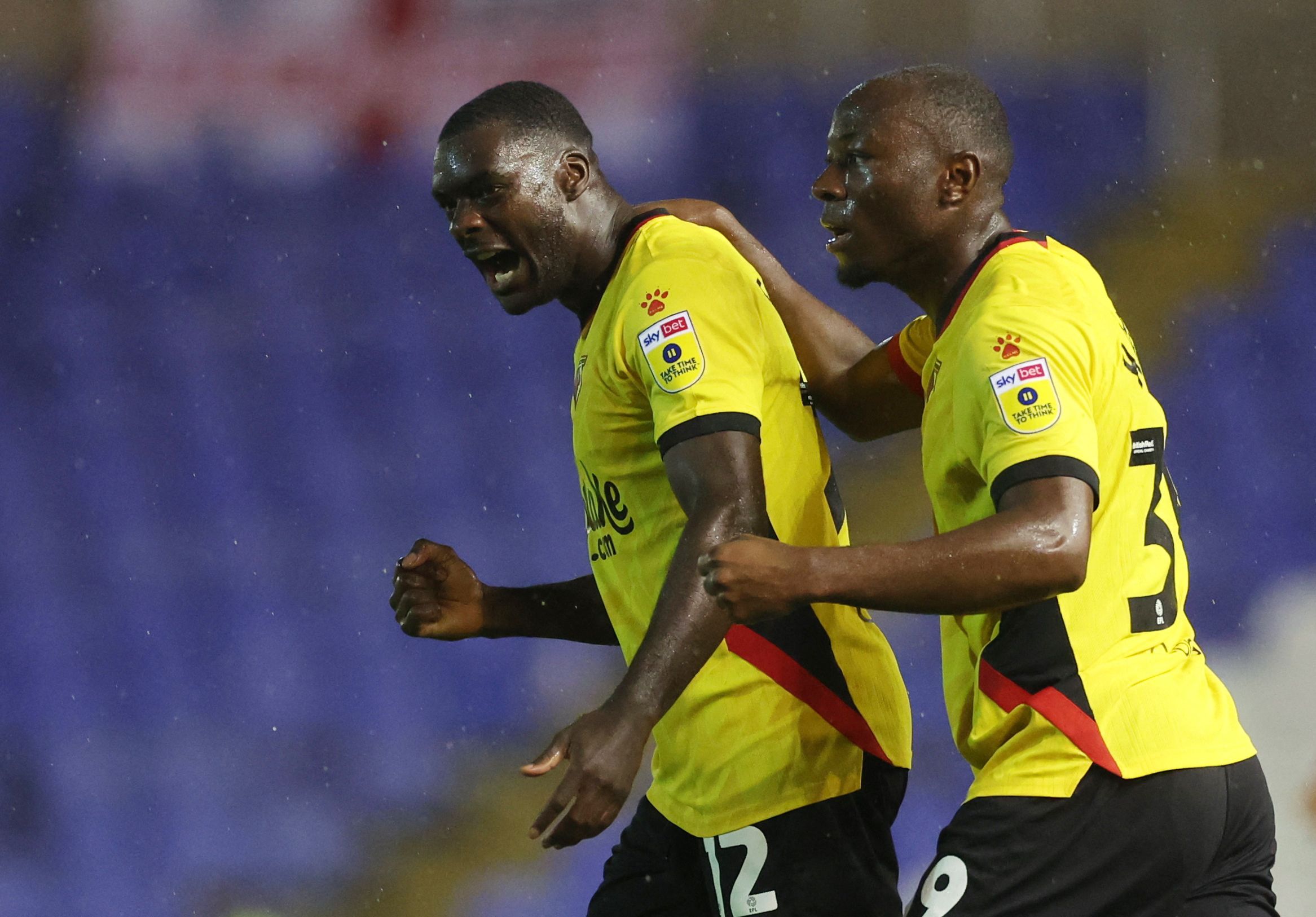 Soccer Football - Birmingham City v Watford - St Andrew's, Birmingham, Britain - August 16, 2022 Watford's Ken Sema celebrates scoring their first goal with teammate Edo Kayembe Action Images/Carl Recine EDITORIAL USE ONLY. No use with unauthorized audio, video, data, fixture lists, club/league logos or 'live' services. Online in-match use limited to 75 images, no video emulation. No use in betting, games or single club /league/player publications.  Please contact your account representative for