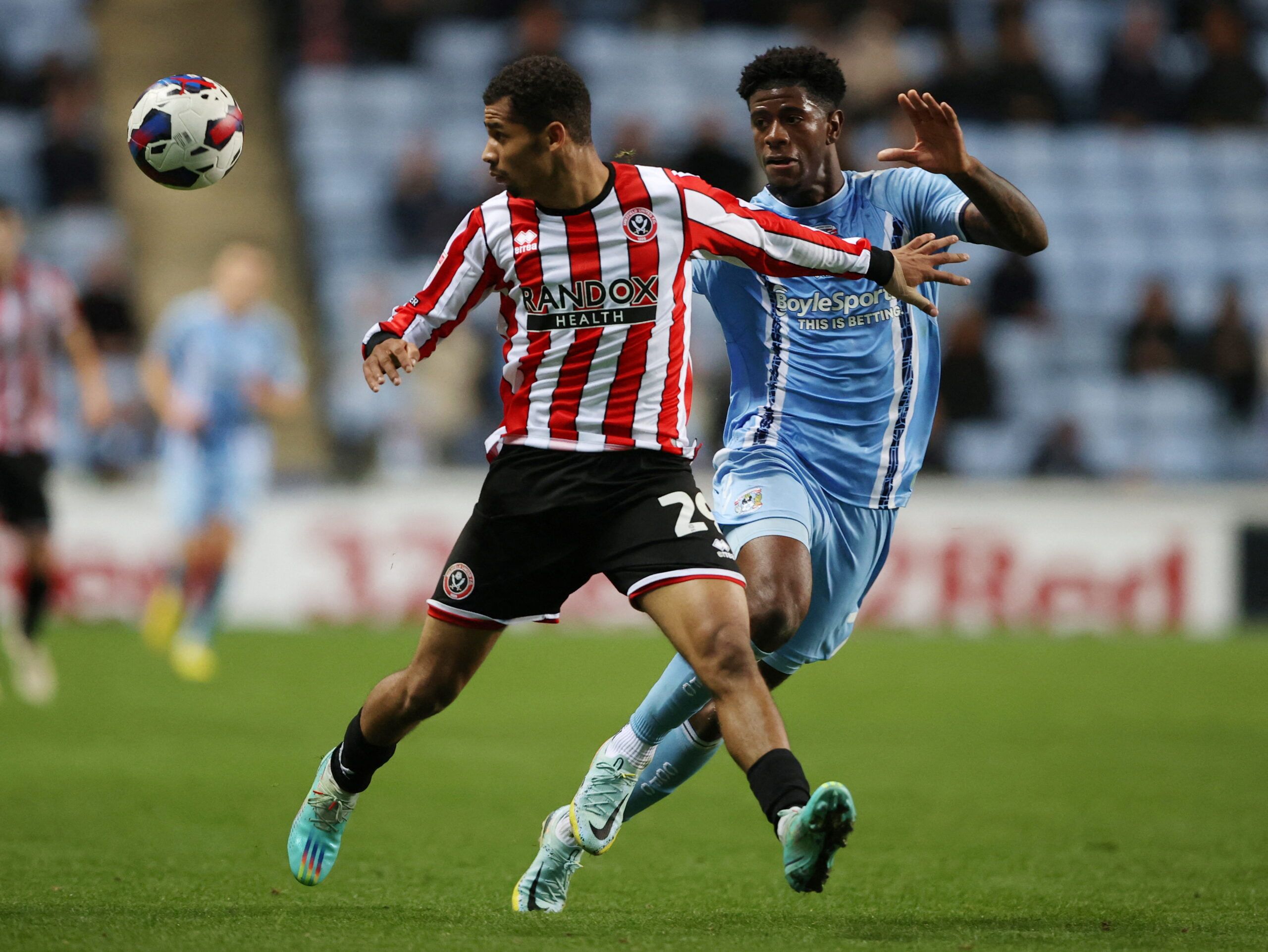 Soccer Football - Championship - Coventry City v Sheffield United - Coventry Building Society Arena, Coventry, Britain - October 19, 2022 Sheffield United's Iliman Ndiaye in action with Coventry City's Jonathan Panzo  Action Images/Molly Darlington  EDITORIAL USE ONLY. No use with unauthorized audio, video, data, fixture lists, club/league logos or 