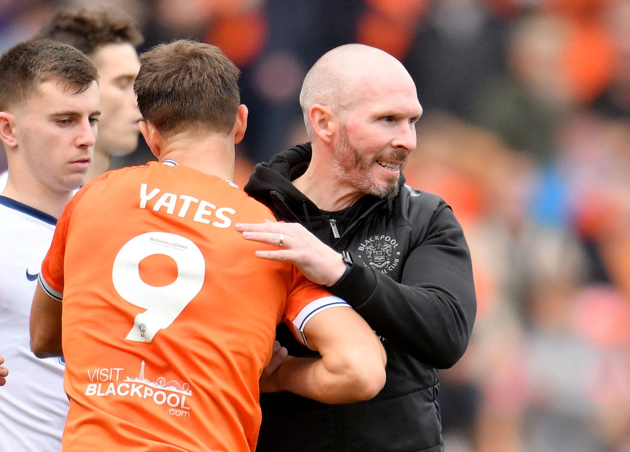 Soccer Football - Championship - Blackpool v Preston North End - Bloomfield Road, Blackpool, Britain - October 22, 2022 Blackpool manager Michael Appleton celebrates with Jerry Yates after the match  Action Images/Paul Burrows  EDITORIAL USE ONLY. No use with unauthorized audio, video, data, fixture lists, club/league logos or 