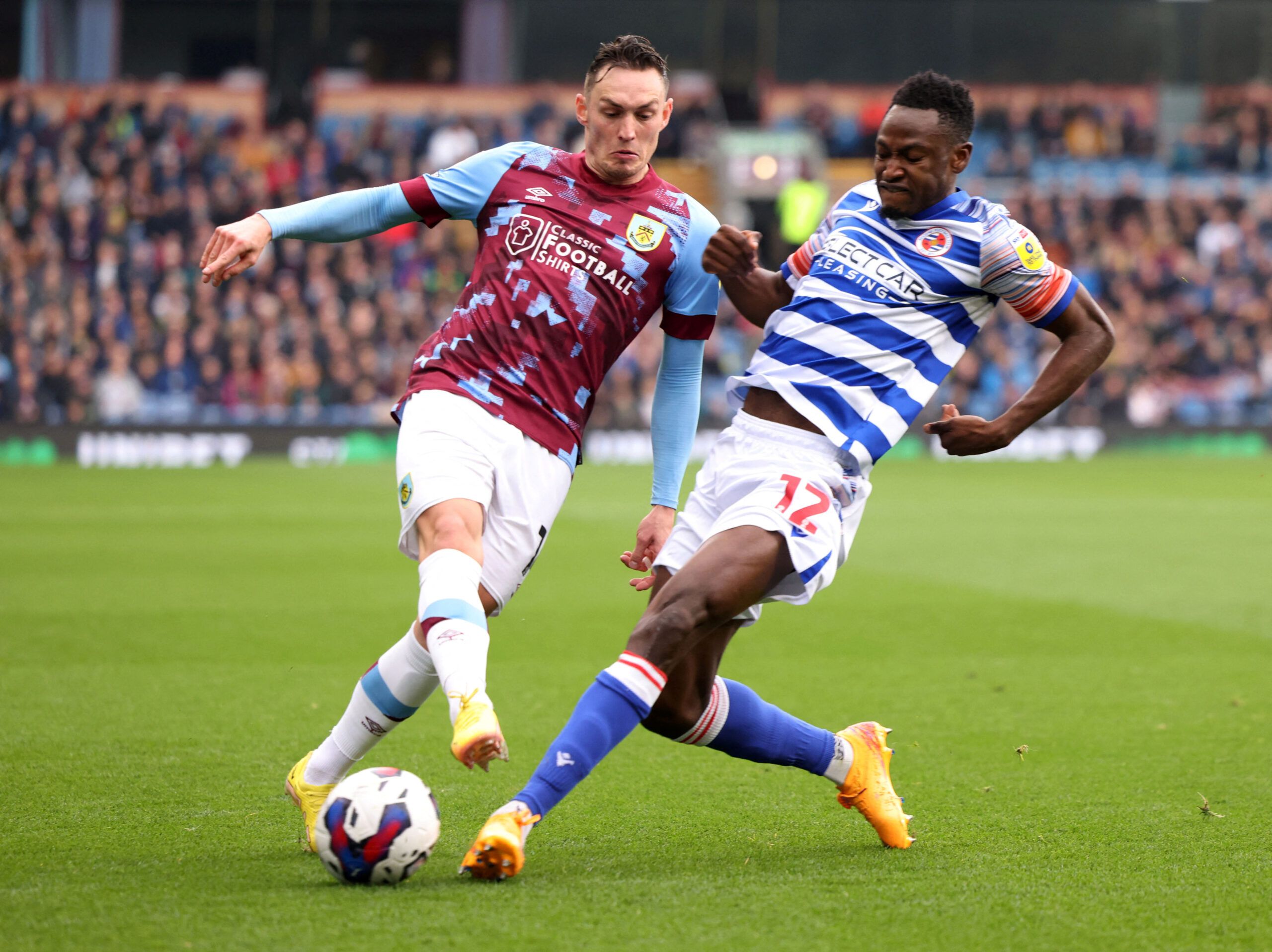 Soccer Football - Championship - Burnley v Reading - Turf Moor, Burnley, Britain - October 29, 2022  Burnley's Connor Roberts in action with Reading's Baba Rahman  Action Images/John Clifton   EDITORIAL USE ONLY. No use with unauthorized audio, video, data, fixture lists, club/league logos or 