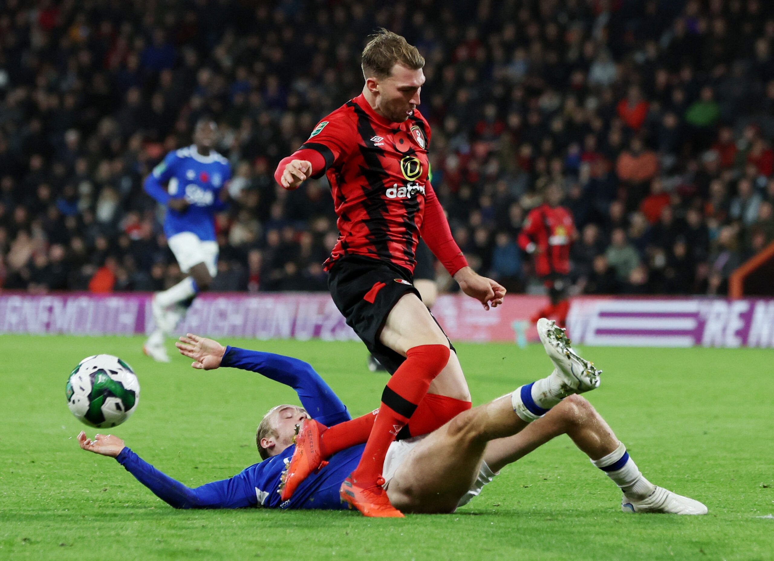 Soccer Football - Carabao Cup Third Round - AFC Bournemouth v Everton - Vitality Stadium, Bournemouth, Britain - November 8, 2022 AFC Bournemouth's Jack Stacey in action with Everton's Tom Davies Action Images via Reuters/Paul Childs EDITORIAL USE ONLY. No use with unauthorized audio, video, data, fixture lists, club/league logos or 'live' services. Online in-match use limited to 75 images, no video emulation. No use in betting, games or single club /league/player publications.  Please contact y