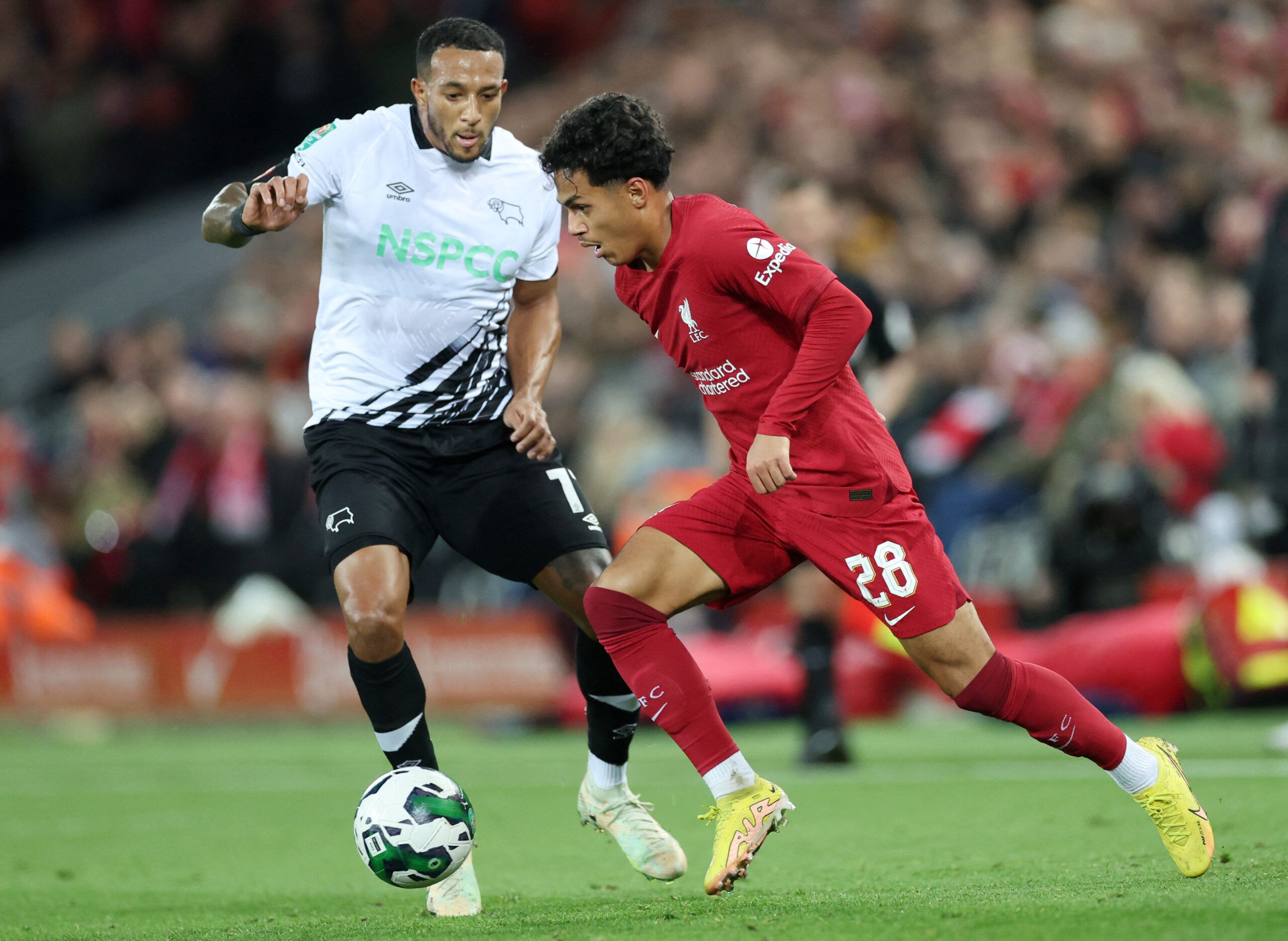 Soccer Football - Carabao Cup Third Round - Liverpool v Derby County - Anfield, Liverpool, Britain - November 9, 2022 Liverpool's Fabio Carvalho in action with Derby County's Nathaniel Mendez-Laing REUTERS/Carl Recine EDITORIAL USE ONLY. No use with unauthorized audio, video, data, fixture lists, club/league logos or 'live' services. Online in-match use limited to 75 images, no video emulation. No use in betting, games or single club /league/player publications.  Please contact your account repr
