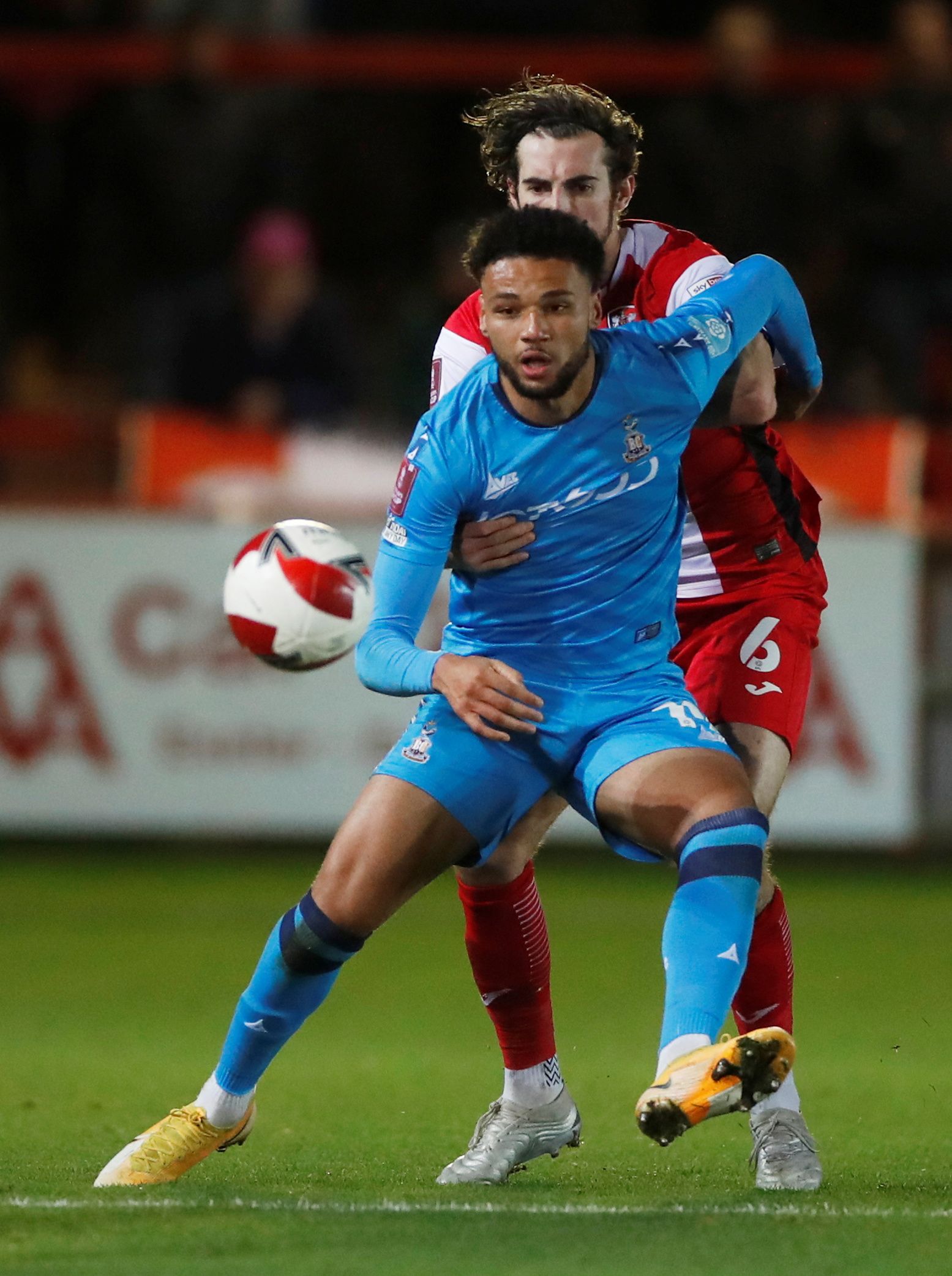 Soccer Football - FA Cup - First Round Replay - Exeter City v Bradford City - St James Park, Exeter, Britain - November 30, 2021 Exeter City's Sam Stubbs in action with Bradford City's Lee Angol  Action Images/Paul Childs