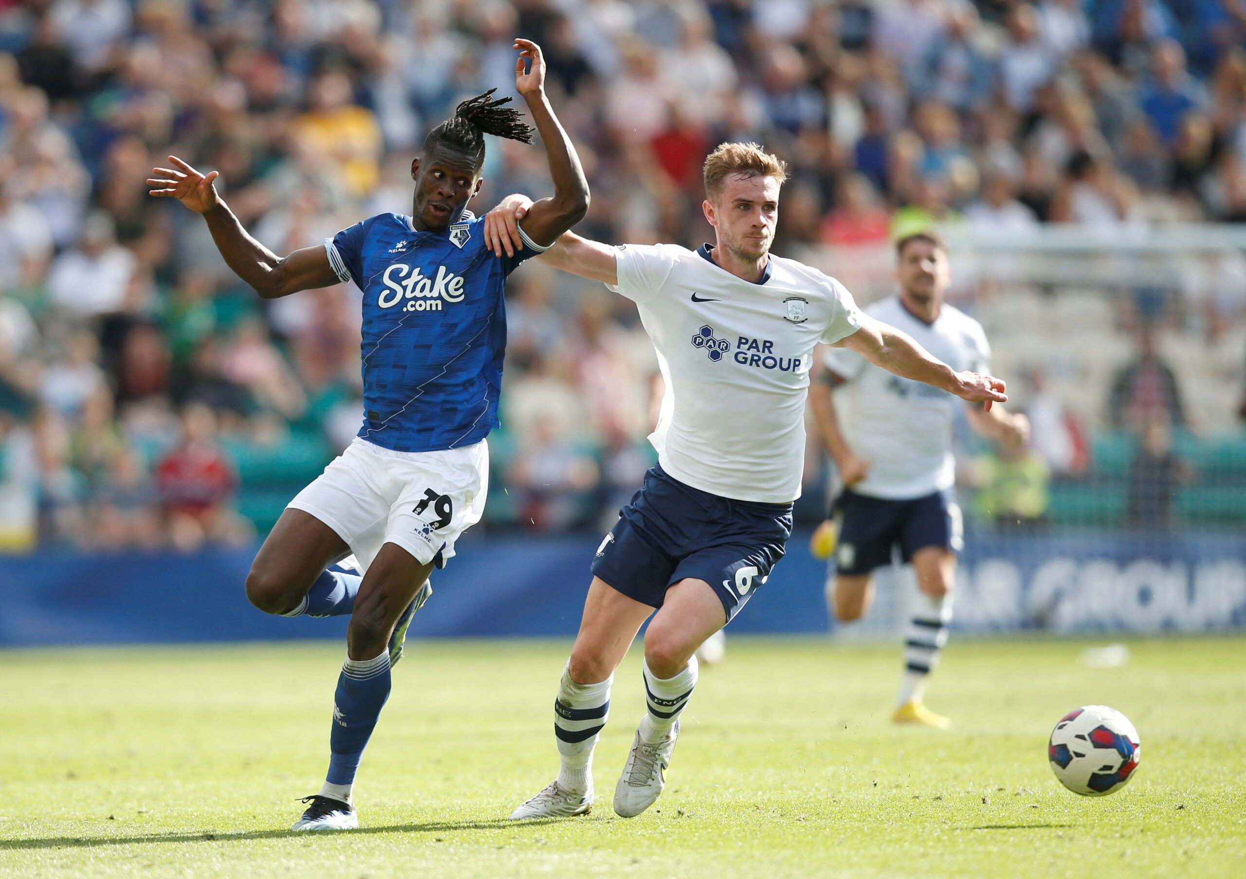 Soccer Football - Championship - Preston North End v Watford - Deepdale, Preston, Britain - August 20, 2022 Watford's Vakoun Bayo and Preston North End's Liam Lindsay in action Action Images/Ed Sykes  EDITORIAL USE ONLY. No use with unauthorized audio, video, data, fixture lists, club/league logos or 
