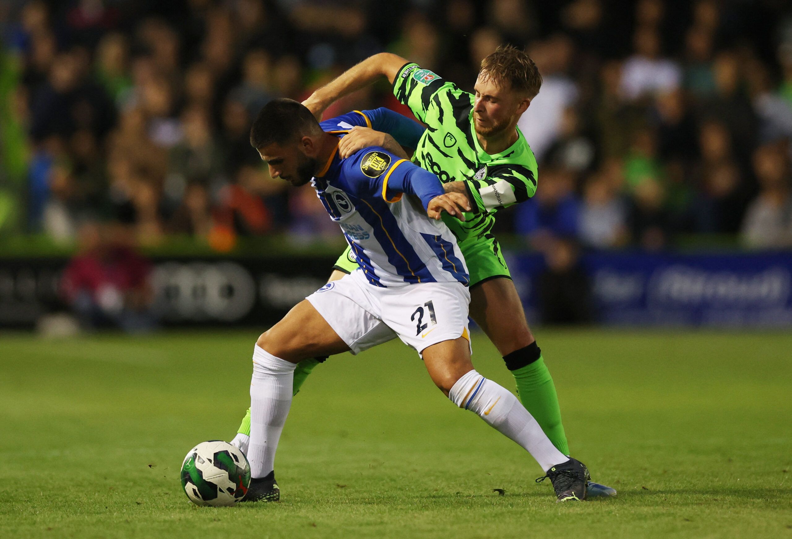 Soccer Football - Carabao Cup Second Round - Forest Green Rovers v Brighton &amp; Hove Albion - The New Lawn, Nailsworth, Britain - August 24, 2022 Forest Green Rovers' Ben Stevenson in action with Brighton &amp; Hove Albion's Deniz Undav Action Images via Reuters/Matthew Childs EDITORIAL USE ONLY. No use with unauthorized audio, video, data, fixture lists, club/league logos or 'live' services. Online in-match use limited to 75 images, no video emulation. No use in betting, games or single club 