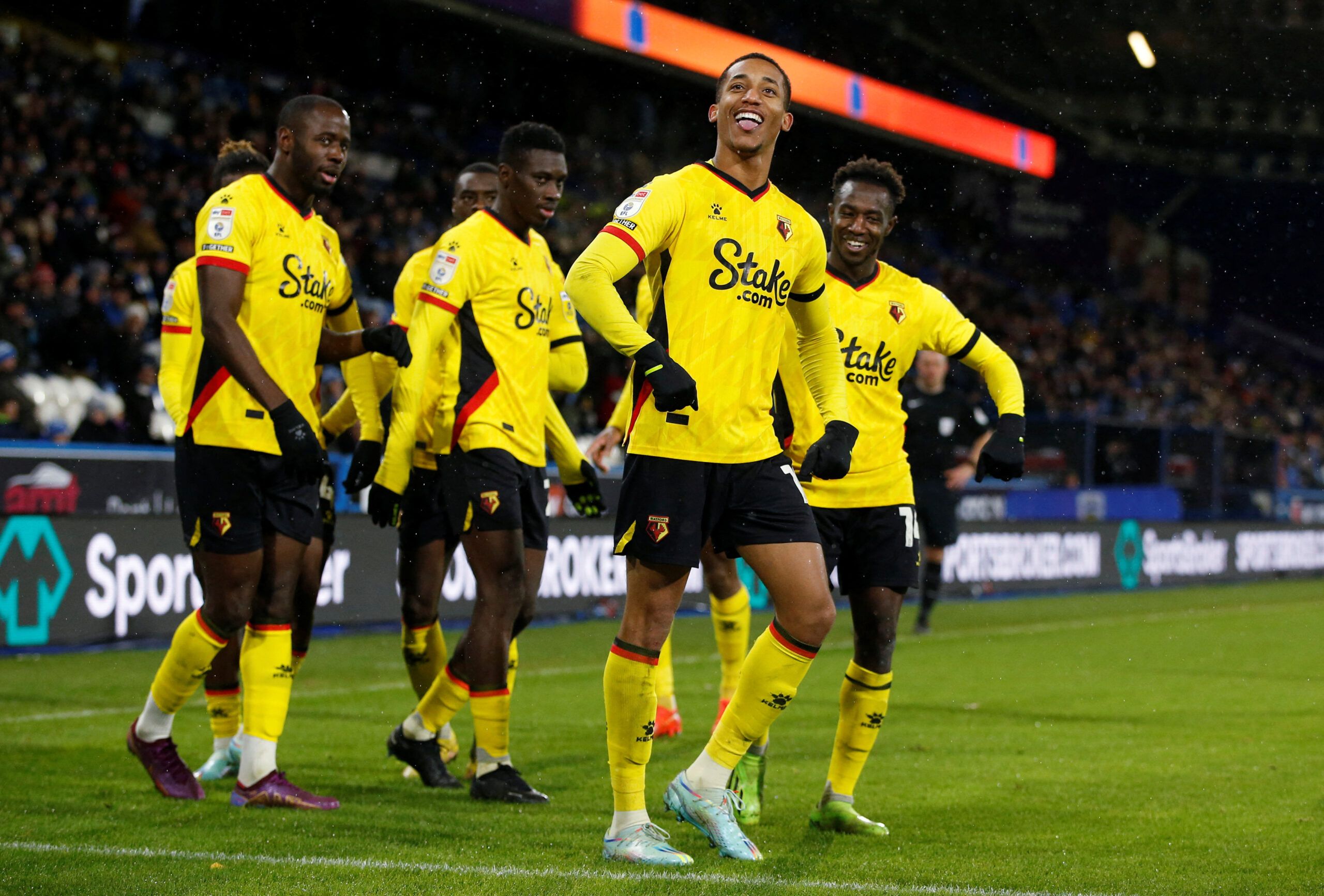 Soccer Football - Championship - Huddersfield Town v Watford - John Smith's Stadium, Huddersfield, Britain - December 17, 2022 Watford's Joao Pedro celebrates scoring their first goal with teammates  Action Images/Ed Sykes  EDITORIAL USE ONLY. No use with unauthorized audio, video, data, fixture lists, club/league logos or 