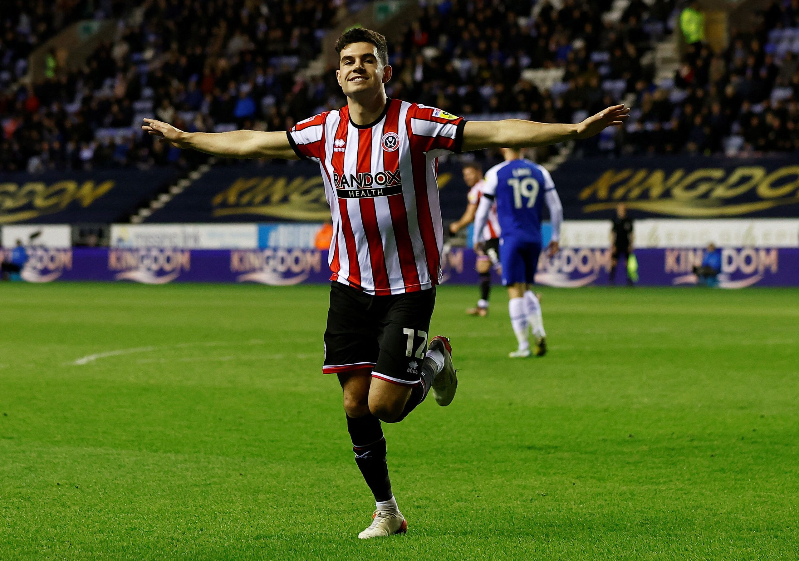 Soccer Football - Championship - Wigan Athletic v Sheffield United - DW Stadium, Wigan, Britain - December 19, 2022 Sheffield United's John Egan celebrates scoring their first goal Action Images/Jason Cairnduff  EDITORIAL USE ONLY. No use with unauthorized audio, video, data, fixture lists, club/league logos or 