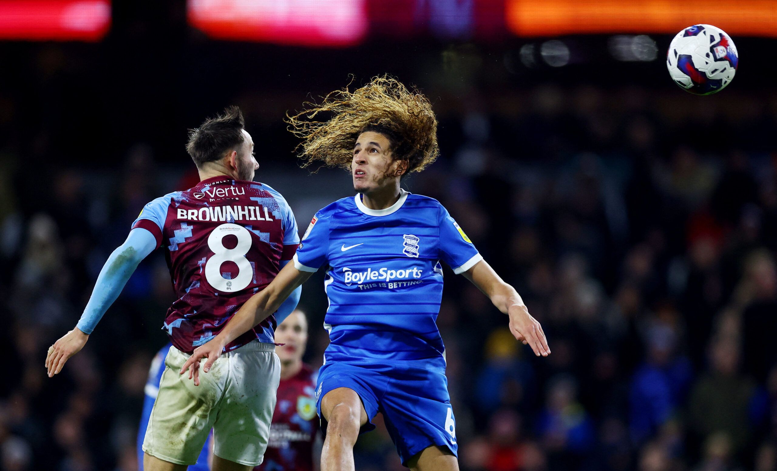 Soccer Football - Championship - Burnley v Birmingham City - Turf Moor, Burnley, Britain - December 27, 2022  Birmingham City's Hannibal Mejbri in action with Burnley's Josh Brownhill Action Images/Lee Smith EDITORIAL USE ONLY. No use with unauthorized audio, video, data, fixture lists, club/league logos or 'live' services. Online in-match use limited to 75 images, no video emulation. No use in betting, games or single club /league/player publications.  Please contact your account representative