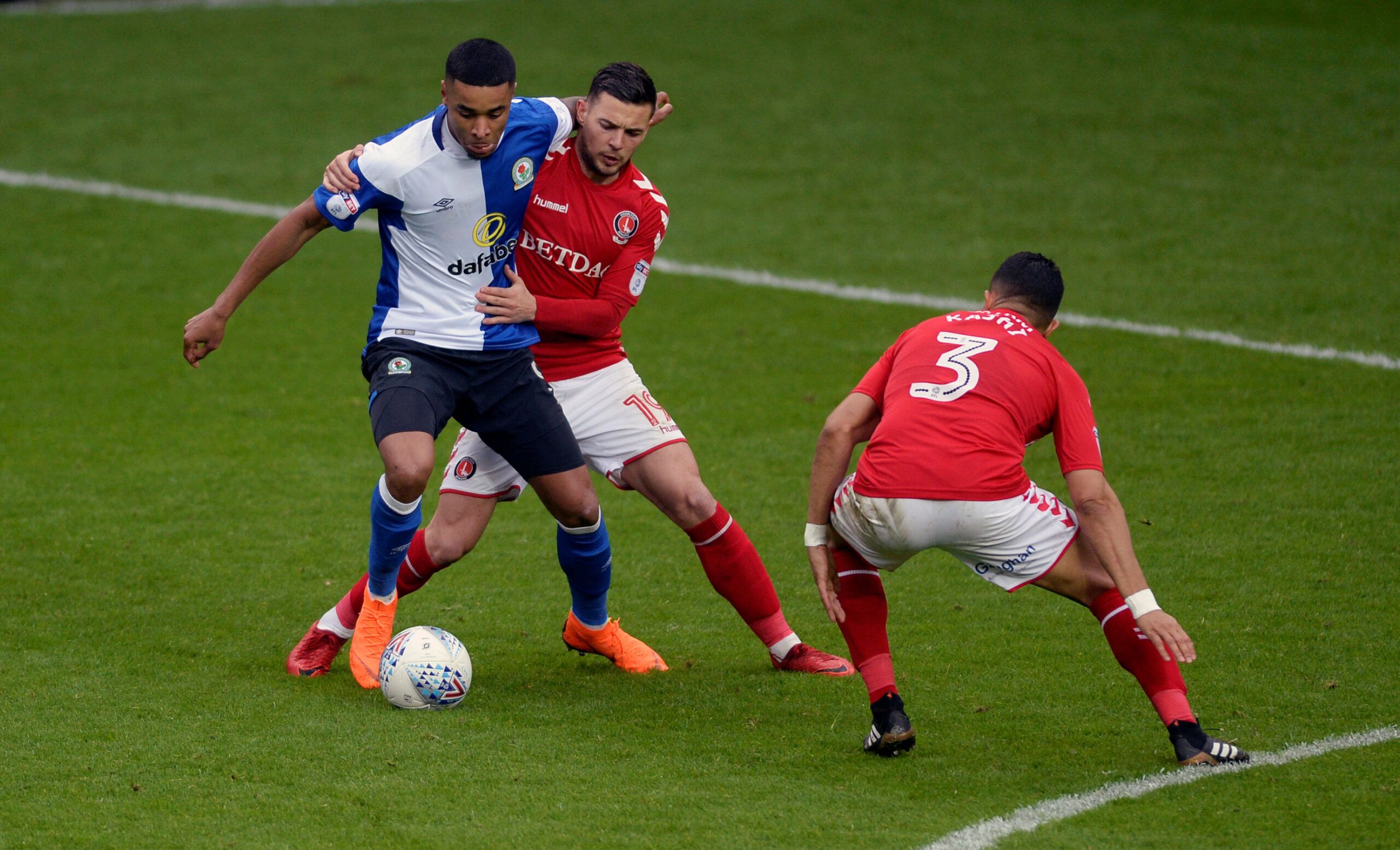Soccer Football - Championship - Charlton Athletic v Blackburn Rovers - The Valley, London, Britain - April 28, 2018  Blackburn Rovers' Dominic Samuel in action with Charlton Athletic's Jake Forster-Caskey and Ahmed Kashi  Action Images/Adam Holt  EDITORIAL USE ONLY. No use with unauthorized audio, video, data, fixture lists, club/league logos or 