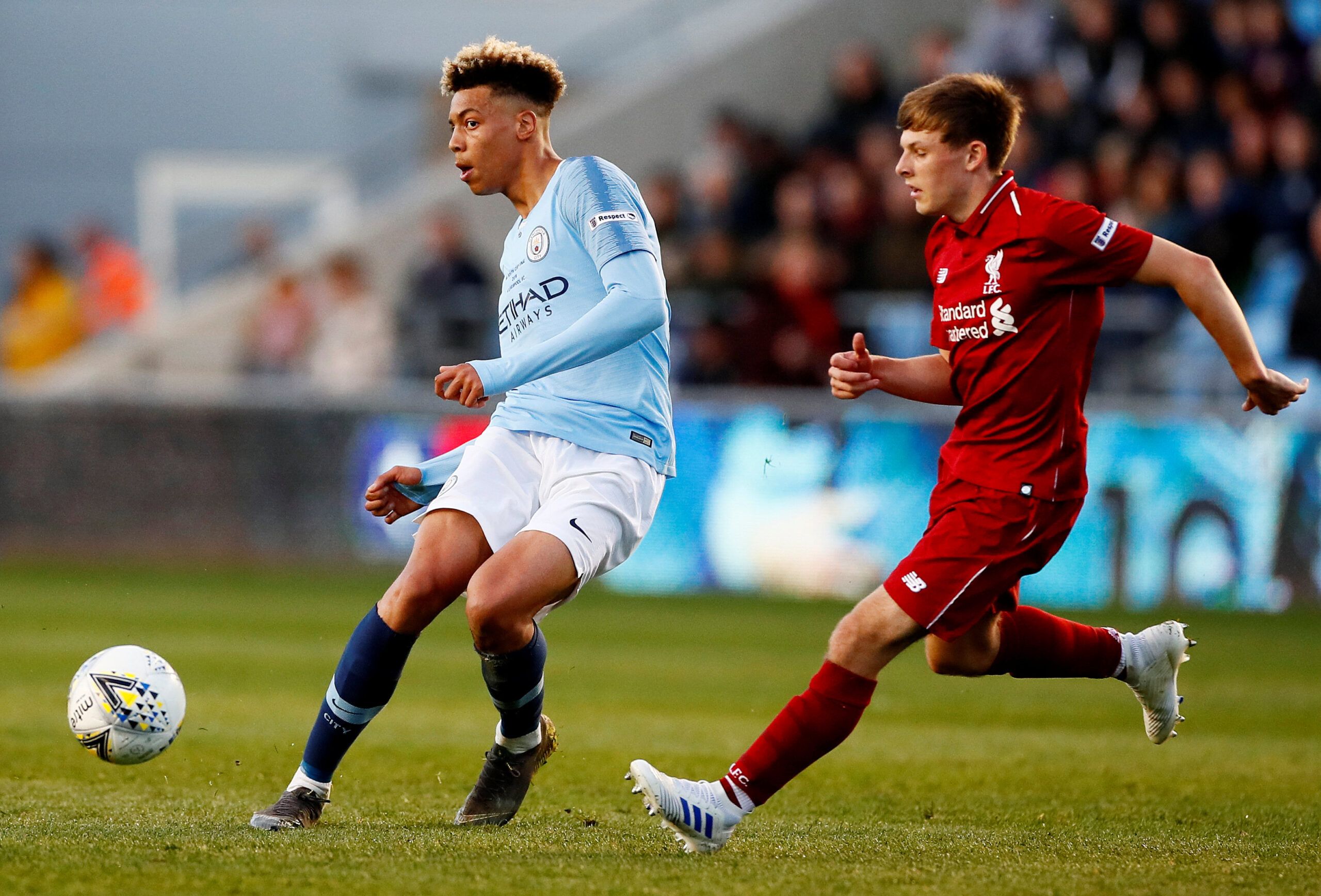 Soccer Football - FA Youth Cup Final - Manchester City v Liverpool - The Academy Stadium, Manchester, Britain - April 25, 2019   Manchester City's Felix Nmecha in action with Liverpool's Leighton Clarkson   Action Images via Reuters/Jason Cairnduff