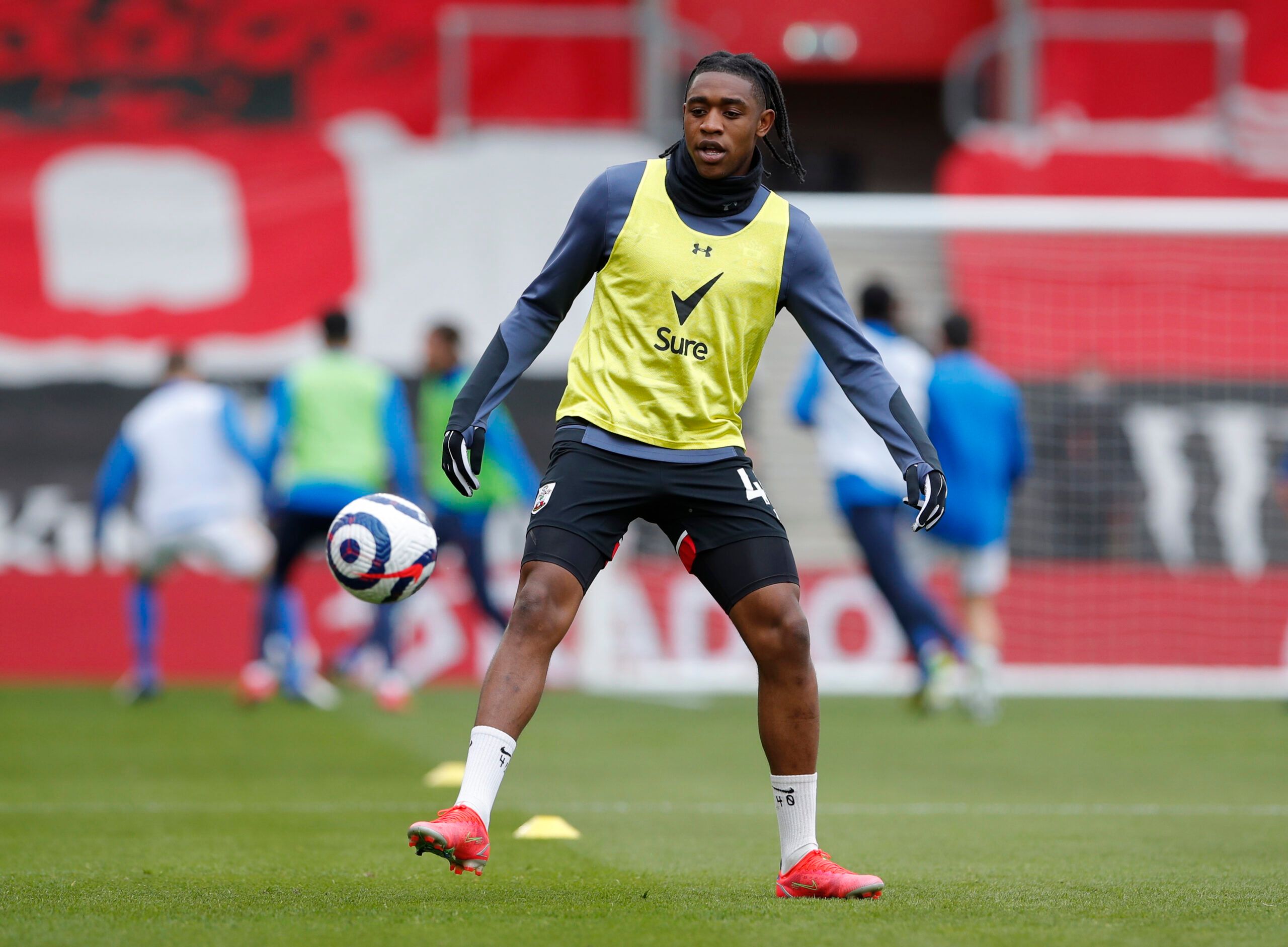 Soccer Football - Premier League - Southampton v Brighton &amp; Hove Albion - St Mary's Stadium, Southampton, Britain - March 14, 2021 Southampton's Daniel N'Lundulu during the warm up before the match Pool via REUTERS/Andrew Couldridge EDITORIAL USE ONLY. No use with unauthorized audio, video, data, fixture lists, club/league logos or 'live' services. Online in-match use limited to 75 images, no video emulation. No use in betting, games or single club /league/player publications.  Please contac