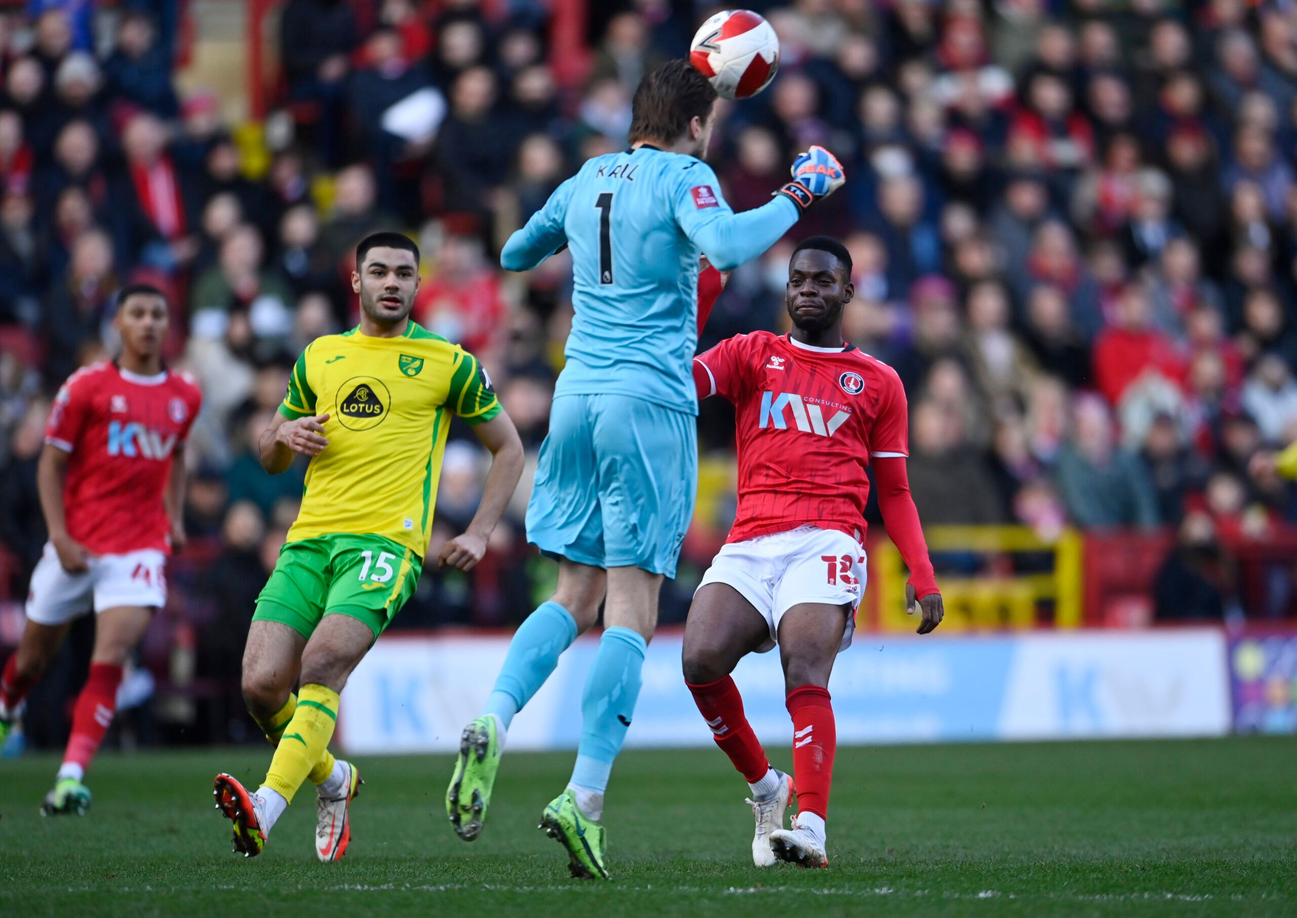 Soccer Football - FA Cup Third Round - Charlton Athletic v Norwich City - The Valley, London, Britain - January 9, 2022 Norwich City's Tim Krul in action with Charlton Athletic's Jonathan Leko REUTERS/Tony Obrien