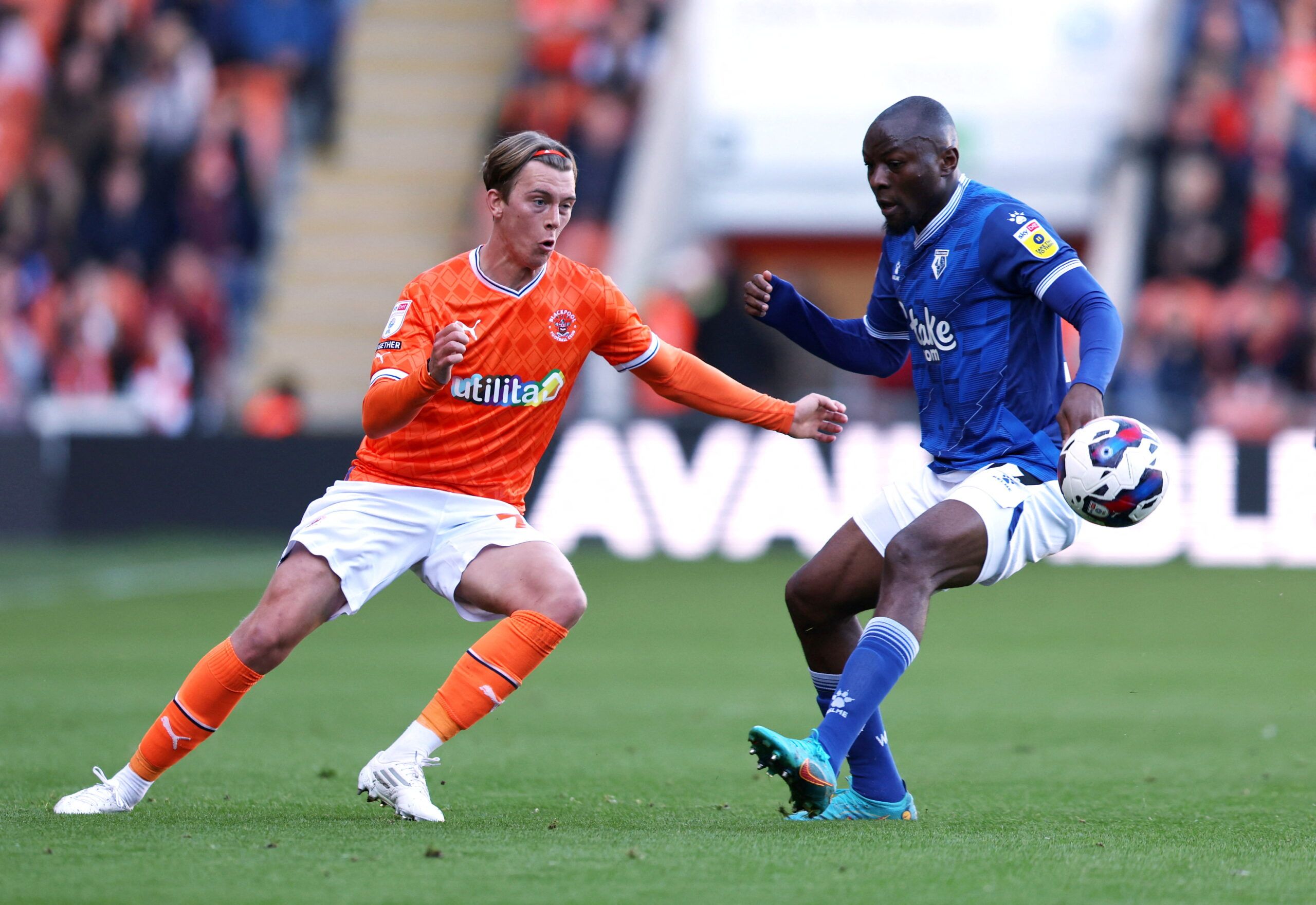 Soccer Football - Championship - Blackpool v Watford - Bloomfield Road, Blackpool, Britain - October 8, 2022 Blackpool's Callum Wright in action with Watford's Edo Kayembe  Action Images/John Clifton  EDITORIAL USE ONLY. No use with unauthorized audio, video, data, fixture lists, club/league logos or 