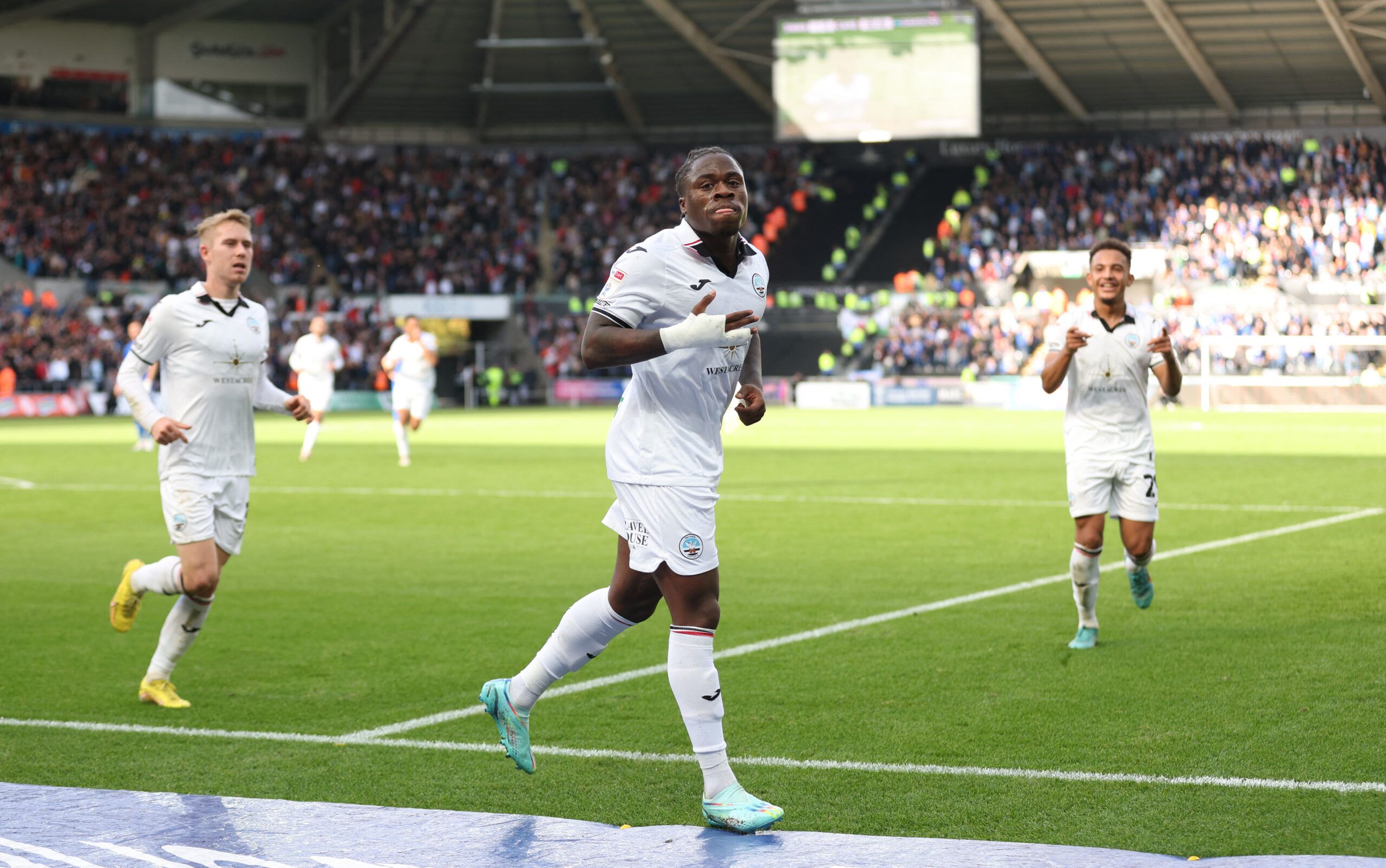 Soccer Football - Championship - Swansea City v Cardiff City - Swansea.com Stadium, Swansea, Britain - October 23, 2022 Swansea City's Michael Obafemi celebrates scoring their second goal Action Images/Matthew Childs EDITORIAL USE ONLY. No use with unauthorized audio, video, data, fixture lists, club/league logos or 'live' services. Online in-match use limited to 75 images, no video emulation. No use in betting, games or single club /league/player publications.  Please contact your account repre