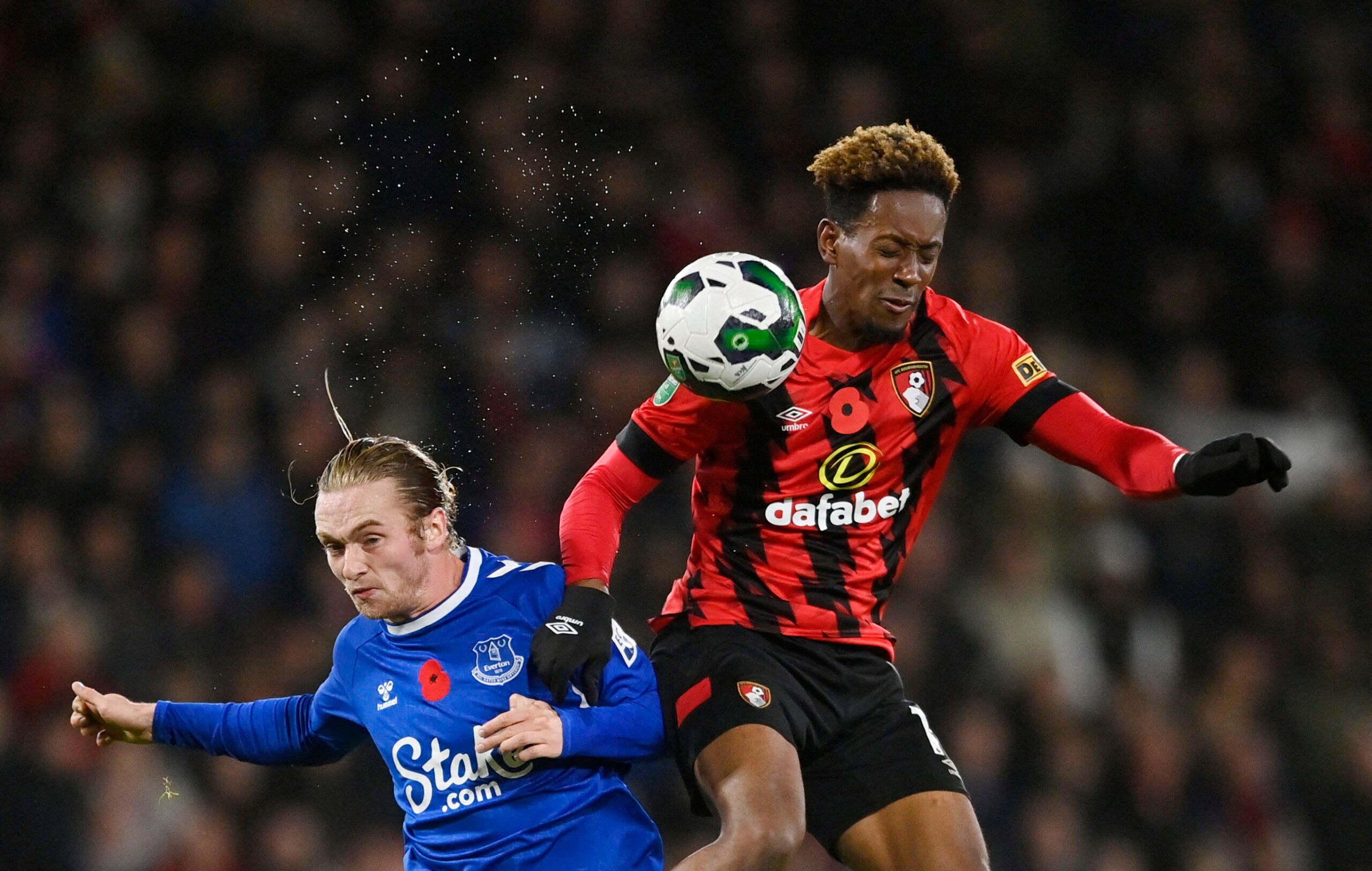 Soccer Football - Carabao Cup Third Round - AFC Bournemouth v Everton - Vitality Stadium, Bournemouth, Britain - November 8, 2022 Everton's Tom Davies in action with AFC Bournemouth's Jamal Lowe REUTERS/Tony Obrien EDITORIAL USE ONLY. No use with unauthorized audio, video, data, fixture lists, club/league logos or 'live' services. Online in-match use limited to 75 images, no video emulation. No use in betting, games or single club /league/player publications.  Please contact your account represe