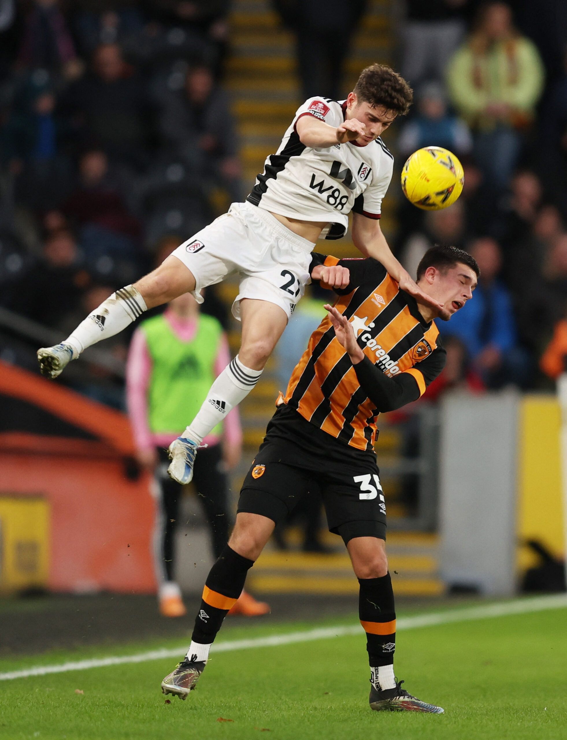 Soccer Football - FA Cup Third Round - Hull City v Fulham - MKM Stadium, Hull, Britain - January 7, 2023 Fulham's Daniel James in action with Hull City's Xavier Simons Action Images via Reuters/John Clifton
