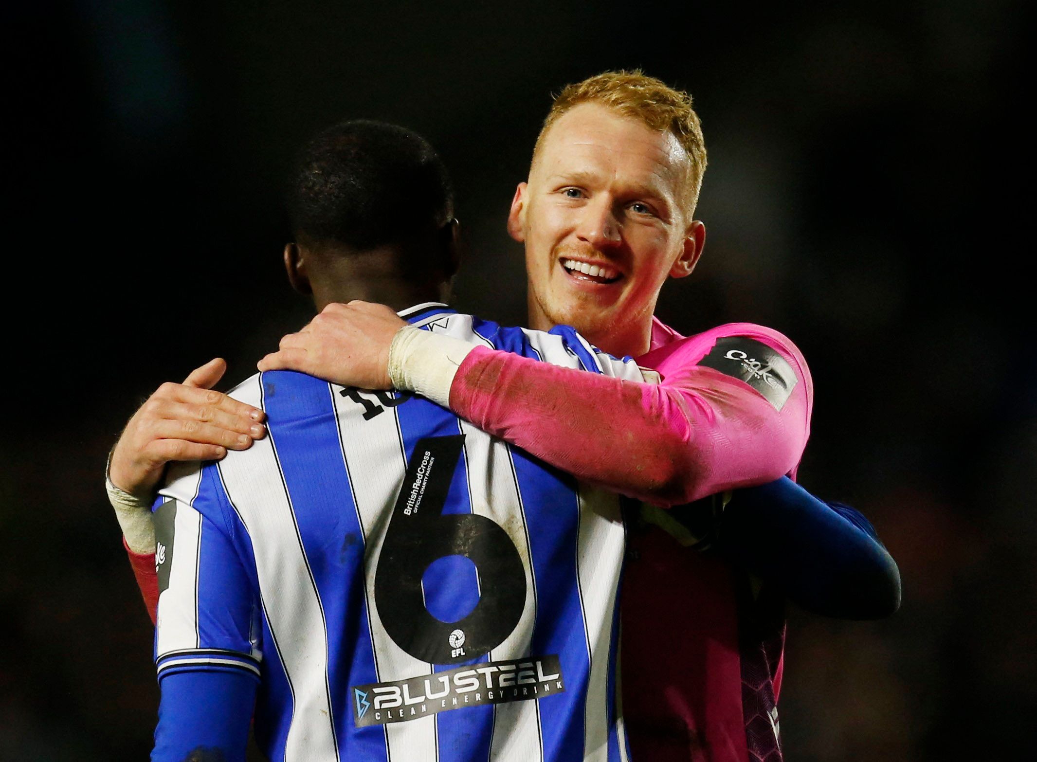 Soccer Football - FA Cup Third Round - Sheffield Wednesday v Newcastle United - Hillsborough Stadium, Sheffield, Britain - January 7, 2023  Sheffield Wednesday's Cameron Dawson celebrates after the match with Dominic Iorfa Action Images via Reuters/Ed Sykes