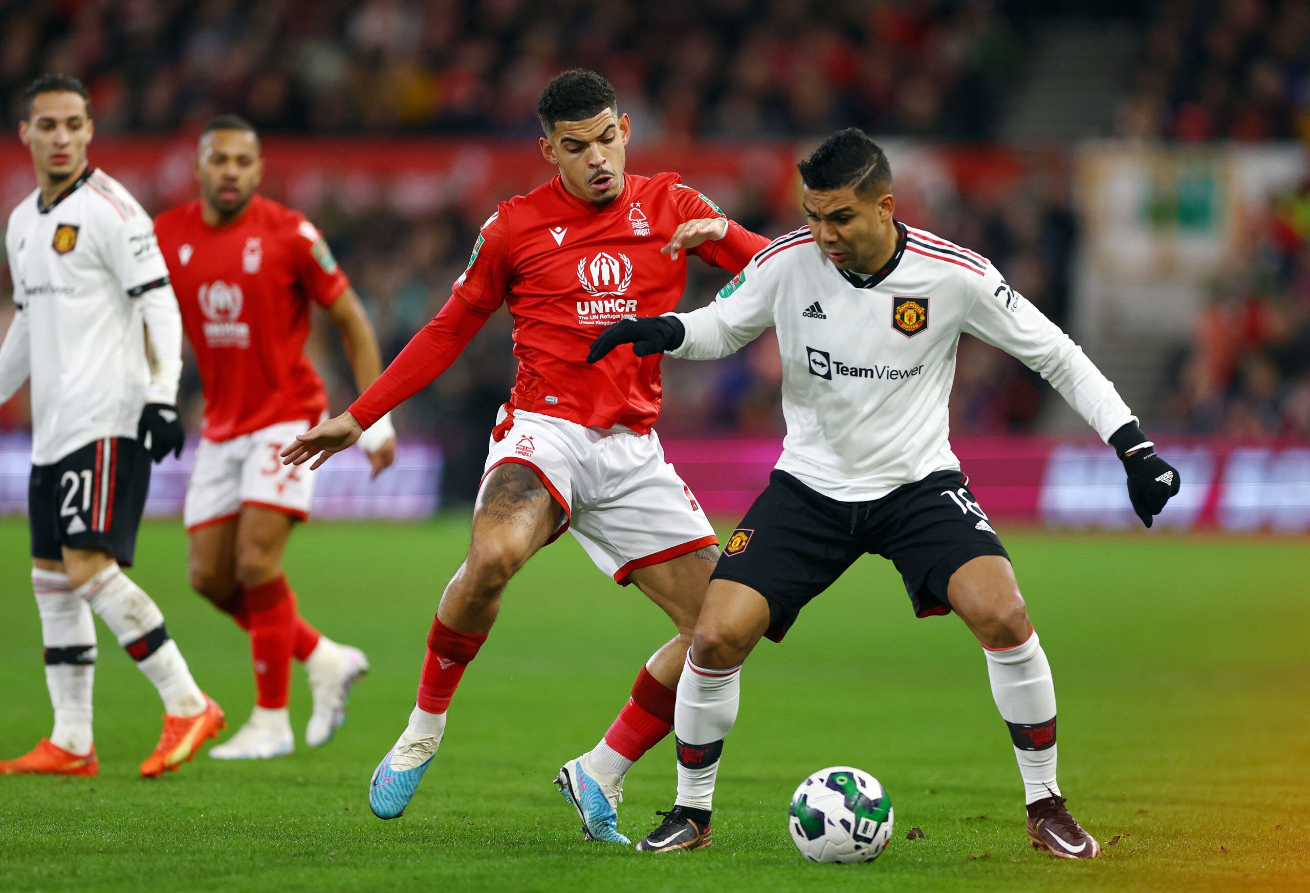 Soccer Football - Carabao Cup - Semi Final - First Leg - Nottingham Forest v Manchester United - The City Ground, Nottingham, Britain - January 25, 2023 Nottingham Forest's Morgan Gibbs-White in action with Manchester United's Casemiro REUTERS/Molly Darlington
