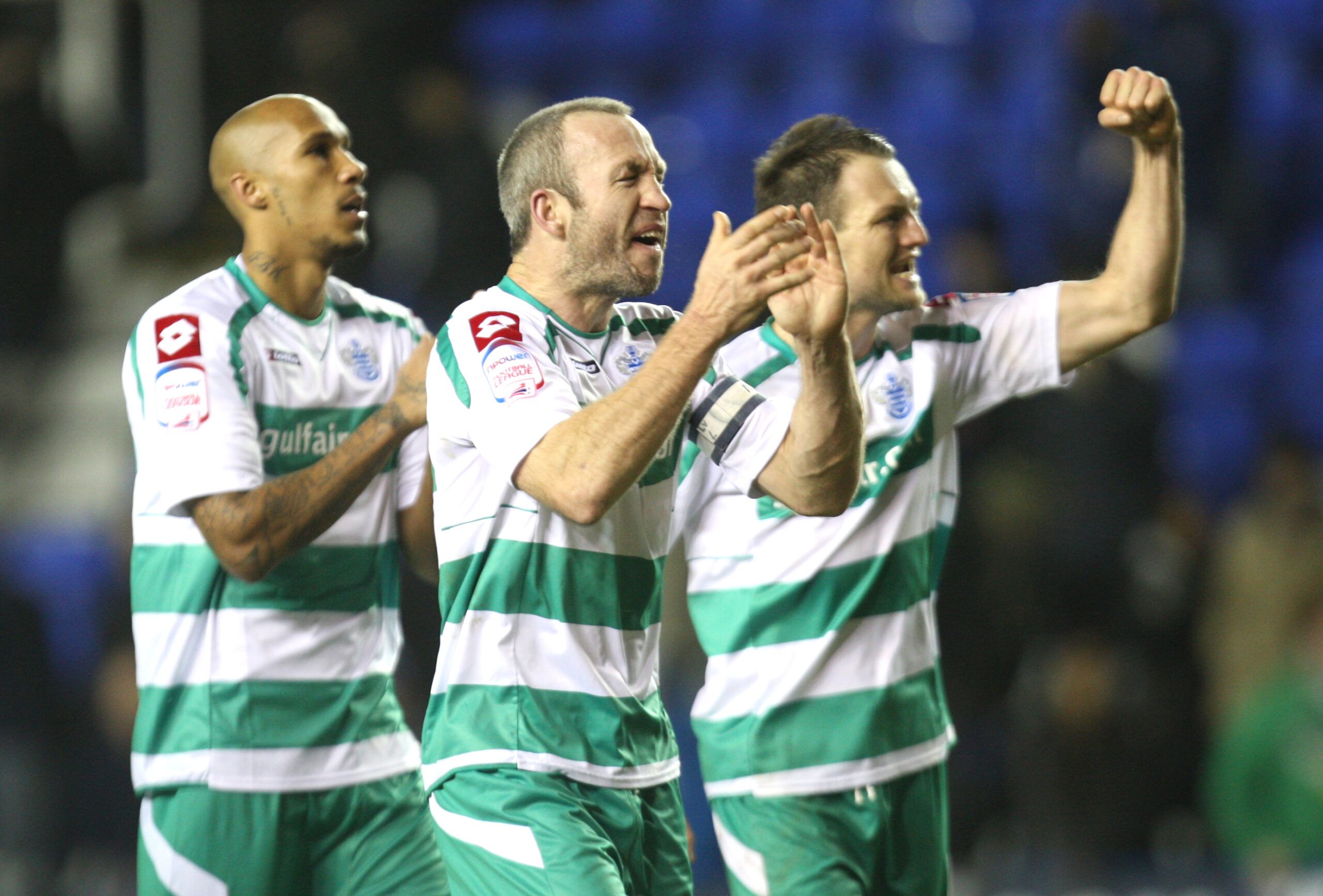 Football - Reading v Queens Park Rangers - npower Football League Championship - The Madejski Stadium - 10/11 - 4/2/11 
(L-R) - Fitz Hall, Shaun Derry and Clint Hill - Queens Park Rangers celebrate victory at full time 
Mandatory Credit: Action Images / Steven Paston