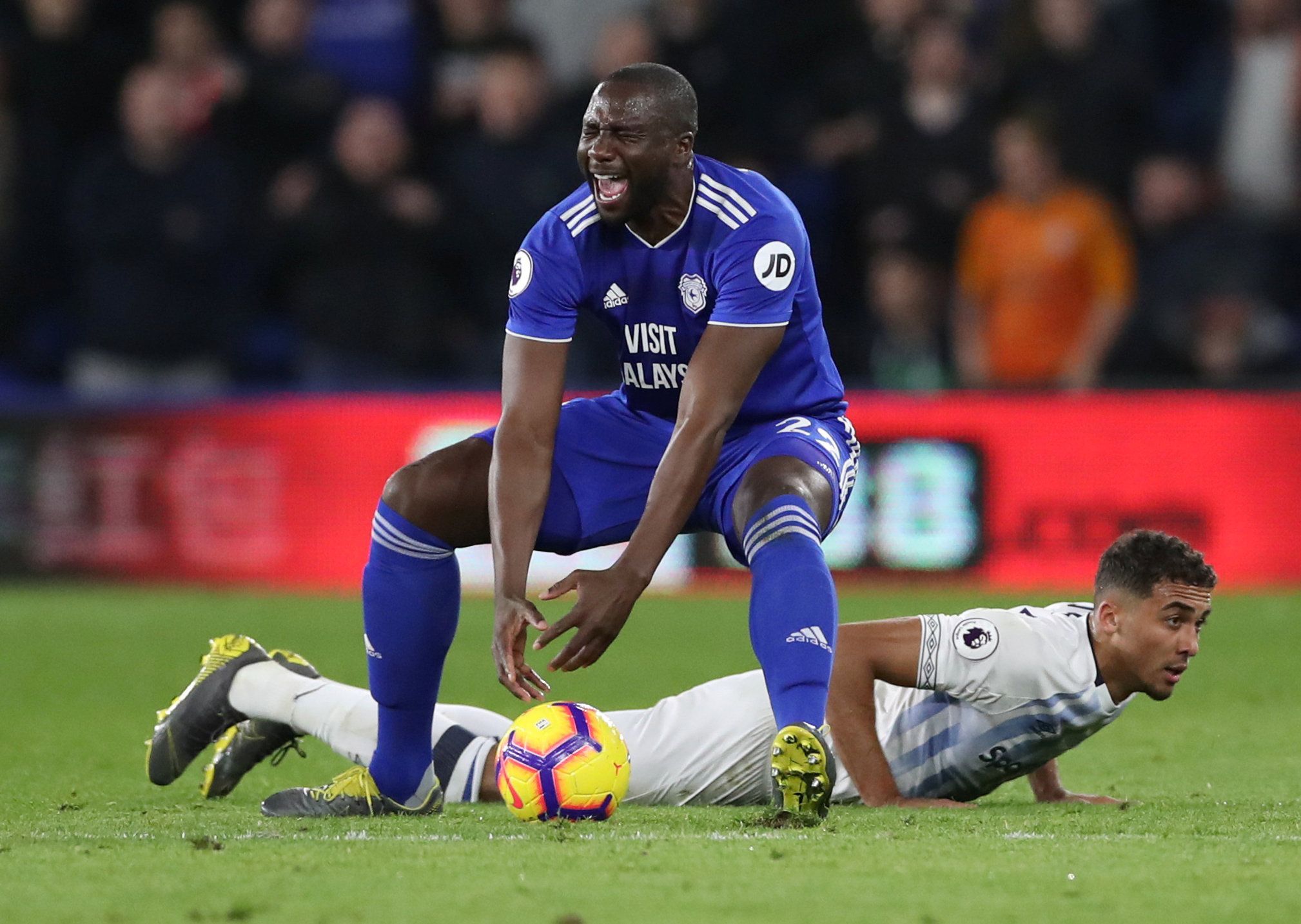 Soccer Football - Premier League - Cardiff City v Everton - Cardiff City Stadium, Cardiff, Britain - February 26, 2019  Cardiff City's Sol Bamba reacts a Everton's Dominic Calvert-Lewin looks on      Action Images via Reuters/Peter Cziborra  EDITORIAL USE ONLY. No use with unauthorized audio, video, data, fixture lists, club/league logos or 