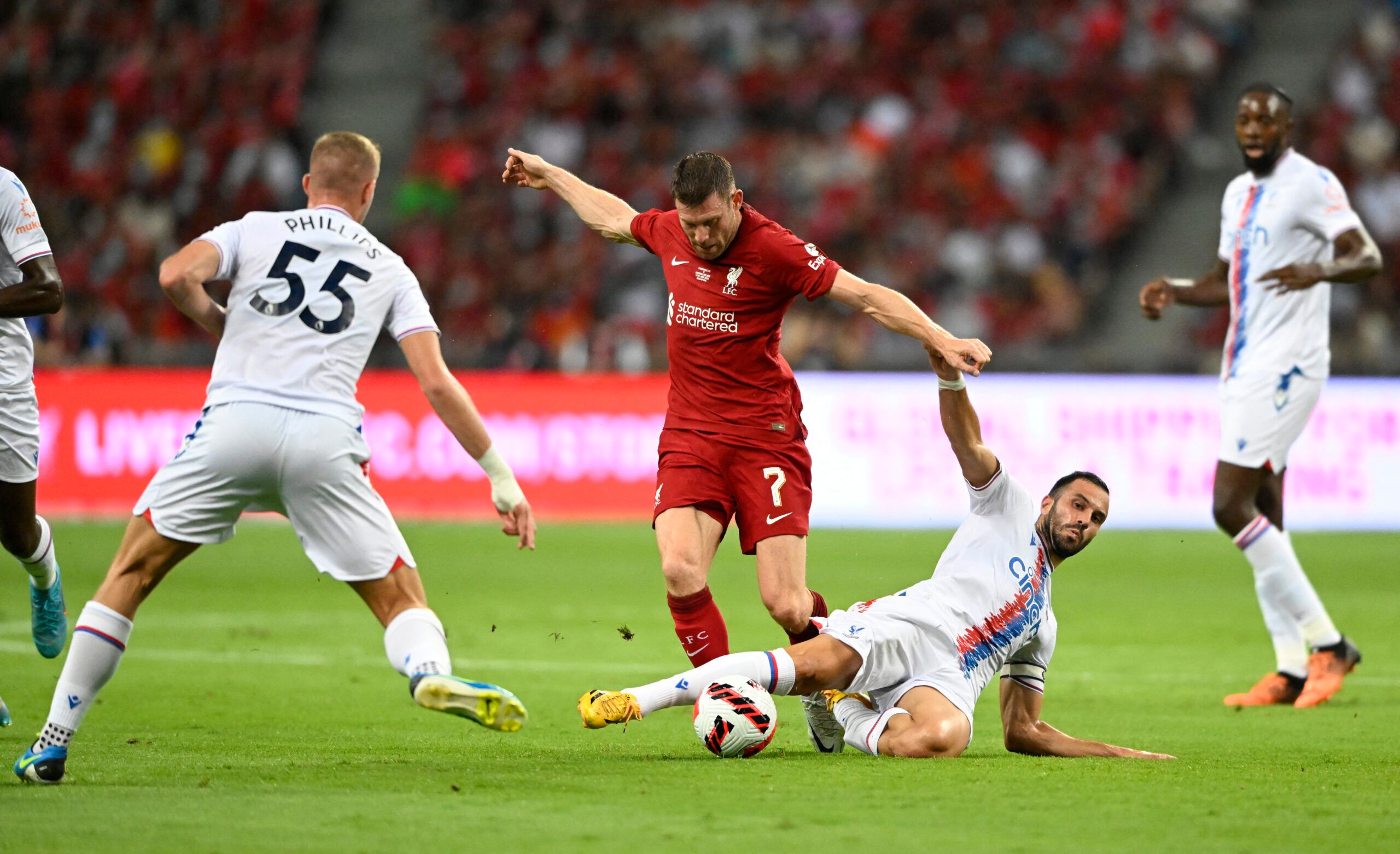 Soccer Football - Pre Season Friendly - Liverpool v Crystal Palace - National Stadium, Kallang, Singapore - July 15, 2022 Liverpool's James Milner in action with Crystal Palace's Luka Milivojevic REUTERS/Caroline Chia
