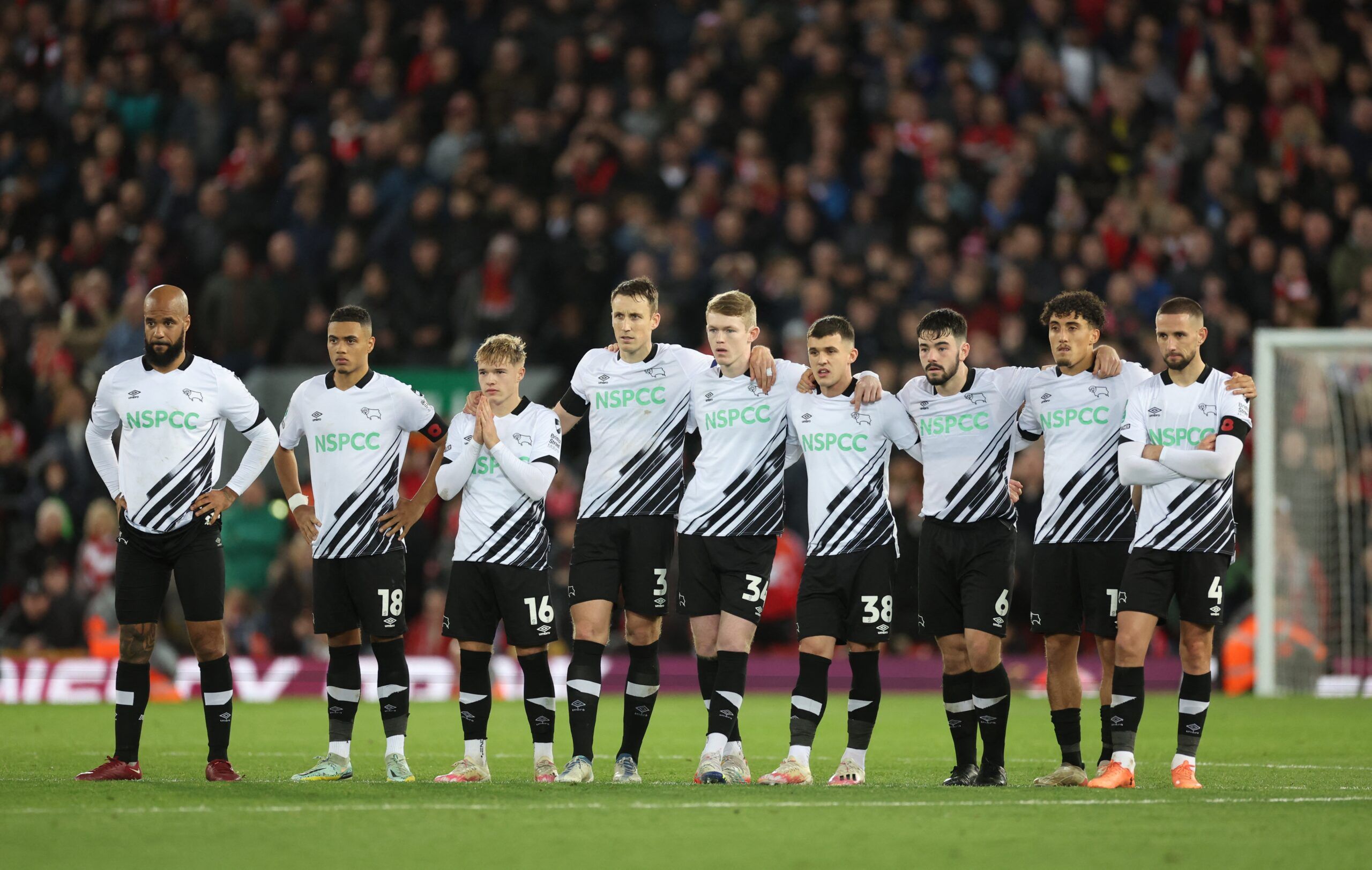 Soccer Football - Carabao Cup Third Round - Liverpool v Derby County - Anfield, Liverpool, Britain - November 9, 2022 Derby County players react during the penalty shoot-out REUTERS/Carl Recine EDITORIAL USE ONLY. No use with unauthorized audio, video, data, fixture lists, club/league logos or 'live' services. Online in-match use limited to 75 images, no video emulation. No use in betting, games or single club /league/player publications.  Please contact your account representative for further d