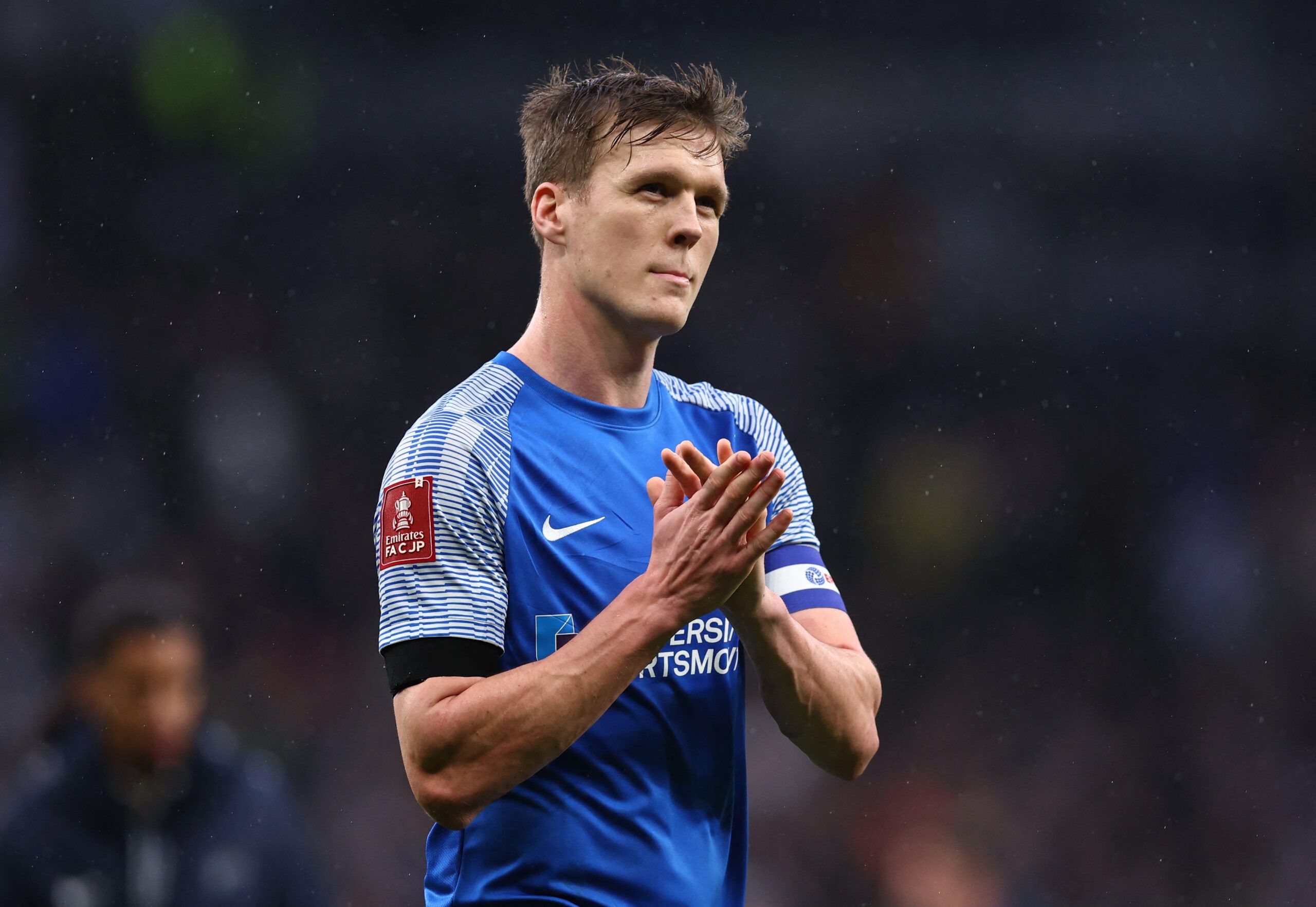 Soccer Football - FA Cup Third Round - Tottenham Hotspur v Portsmouth - Tottenham Hotspur Stadium, London, Britain - January 7, 2023 Portsmouth's Sean Raggett looks dejected after the match REUTERS/David Klein