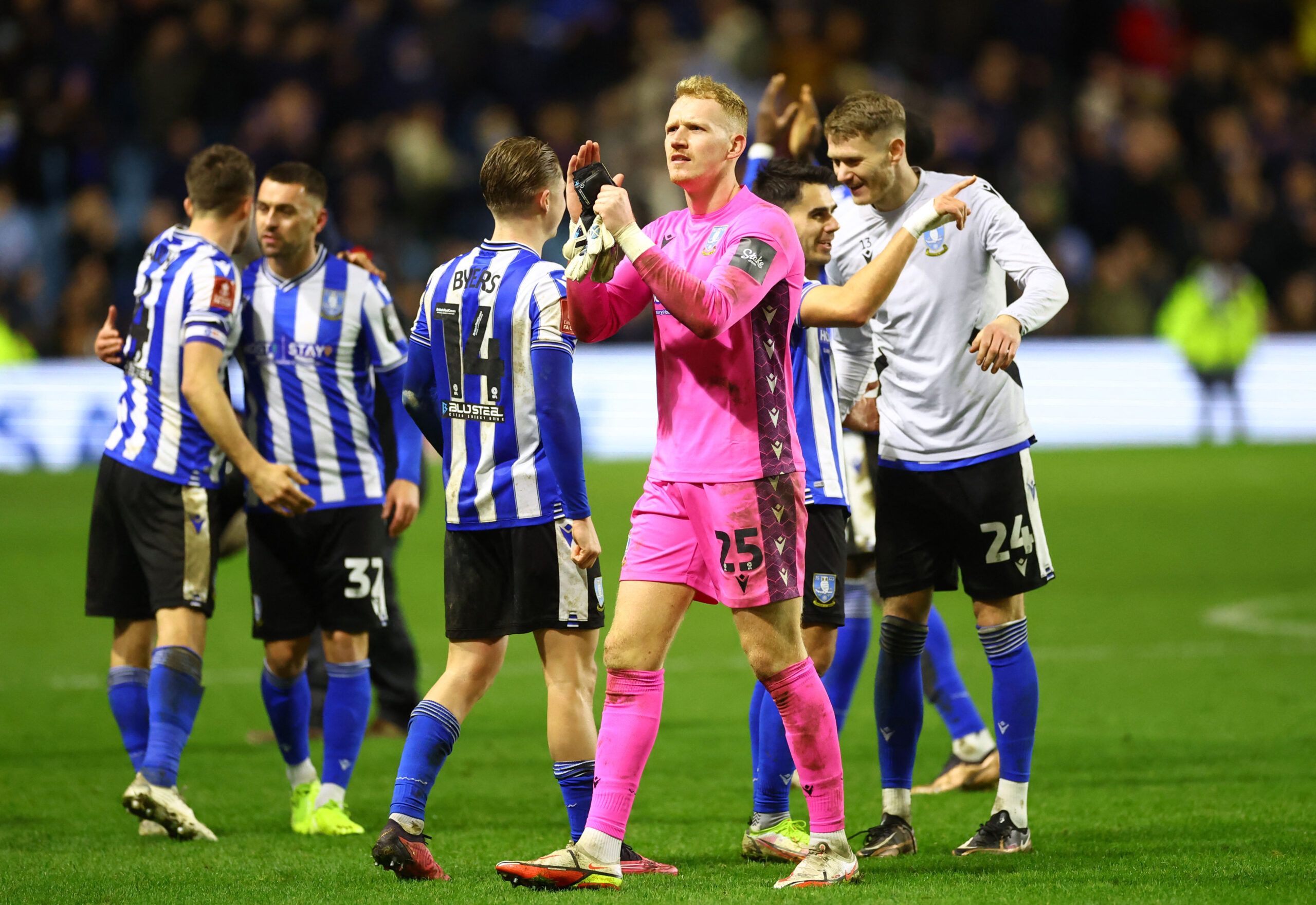 Soccer Football - FA Cup Third Round - Sheffield Wednesday v Newcastle United - Hillsborough Stadium, Sheffield, Britain - January 7, 2023 Sheffield Wednesday's Cameron Dawson and teammates celebrate after the match REUTERS/Carl Recine