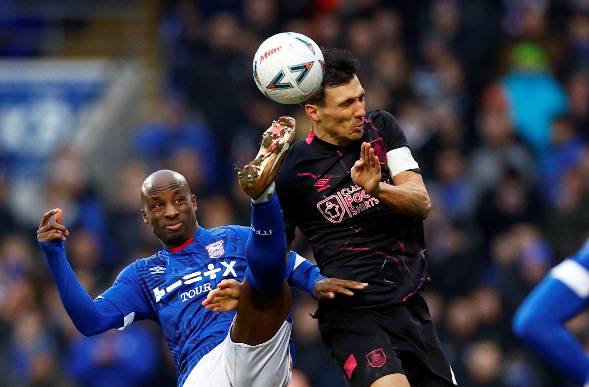 Soccer Football - FA Cup - Fourth Round - Ipswich Town v Burnley - Portman Road, Ipswich, Britain - January 28, 2023 Ipswich Towns Sone Aluko in action with Burnleys Jack Cork  Action Images/Peter Cziborra