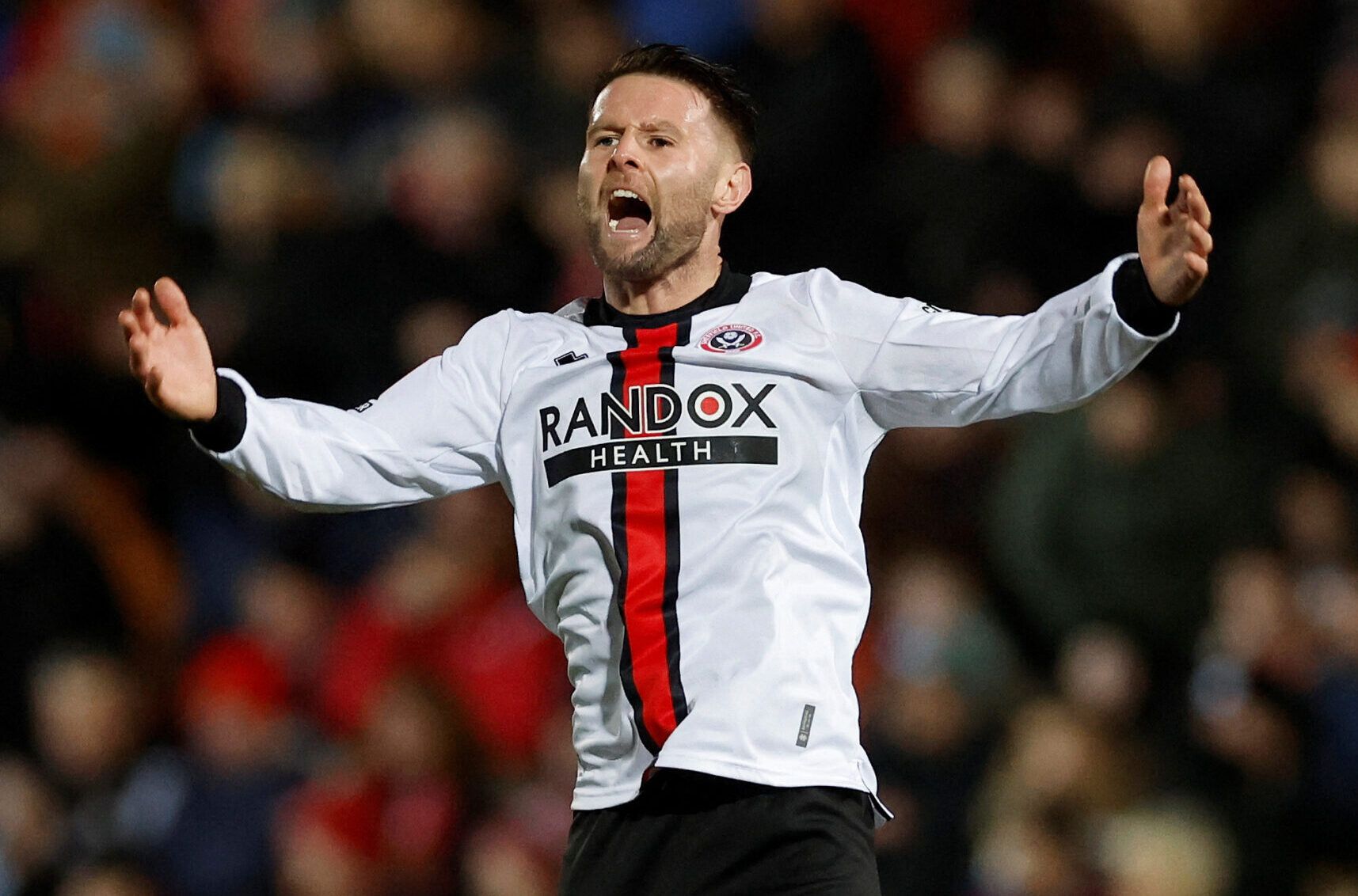 Soccer Football - FA Cup - Fourth Round - Wrexham v Sheffield United - Racecourse Ground, Wrexham, Britain - January 29, 2023 Sheffield United's Oliver Norwood celebrates scoring their second goal  Action Images/Jason Cairnduff