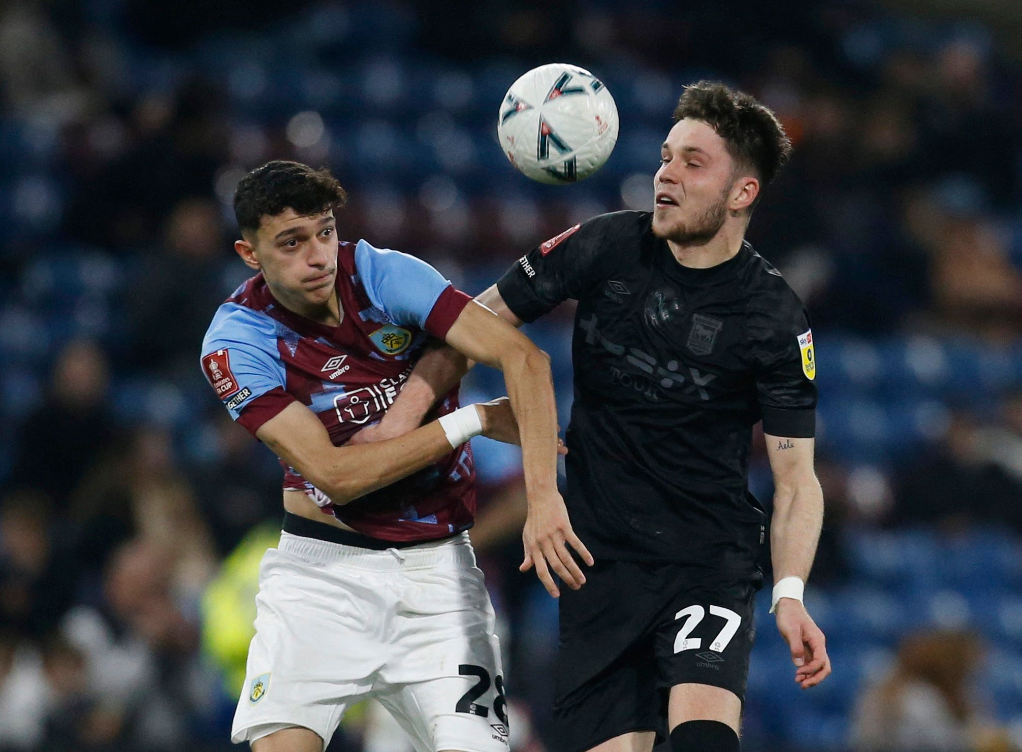 Soccer Football - FA Cup Fourth Round Replay - Burnley v Ipswich Town - Turf Moor, Burnley, Britain - February 7, 2023 Burnley's Ameen Al Dakhil in action with Ipswich Town's George Hirst Action Images/Ed Sykes