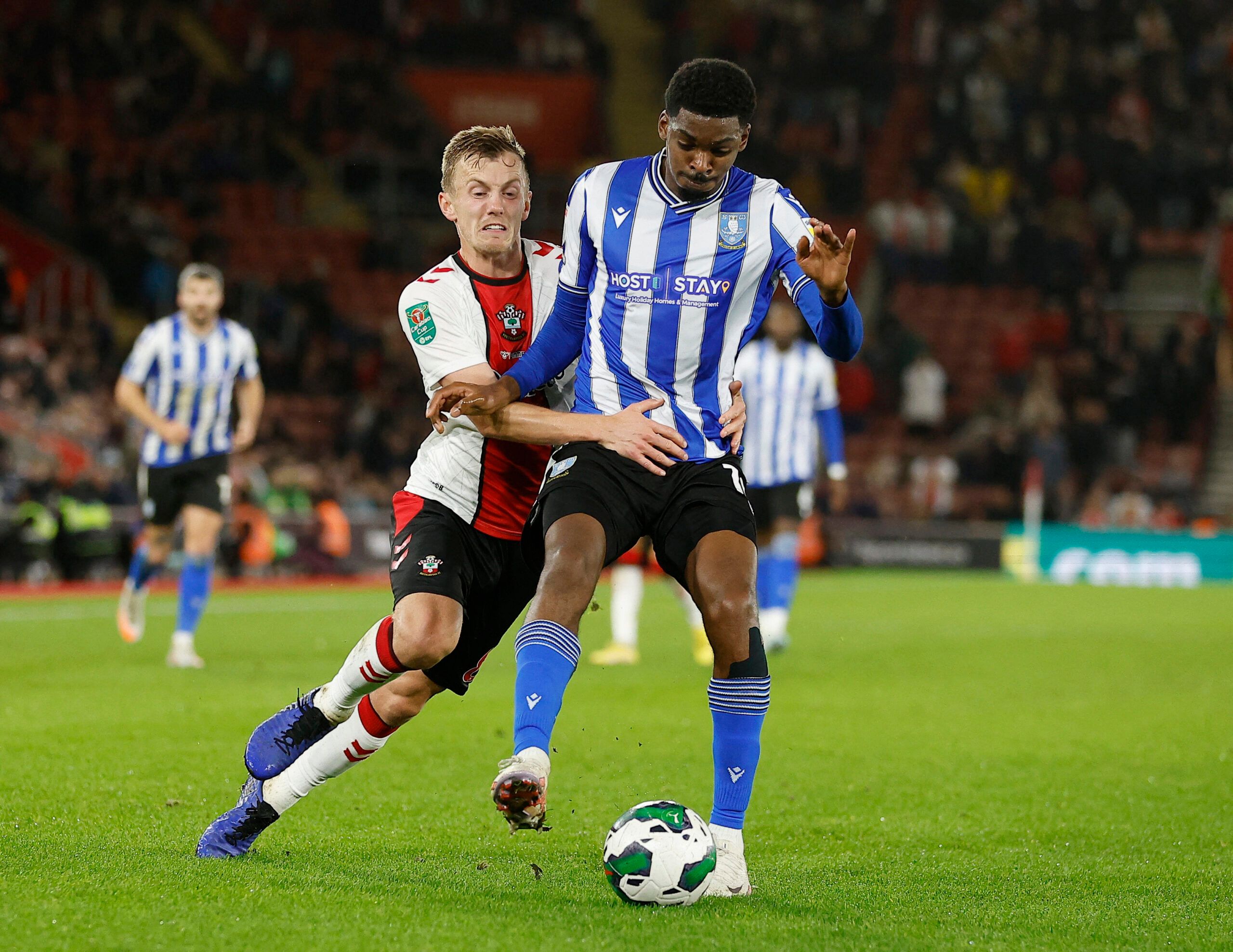 Soccer Football - Carabao Cup Third Round - Southampton v Sheffield Wednesday - St Mary's Stadium, Southampton, Britain - November 9, 2022  Sheffield Wednesday's Tyreeq Bakinson in action with Southampton's James Ward-Prowse REUTERS/Peter Nicholls EDITORIAL USE ONLY. No use with unauthorized audio, video, data, fixture lists, club/league logos or 'live' services. Online in-match use limited to 75 images, no video emulation. No use in betting, games or single club /league/player publications.  Pl