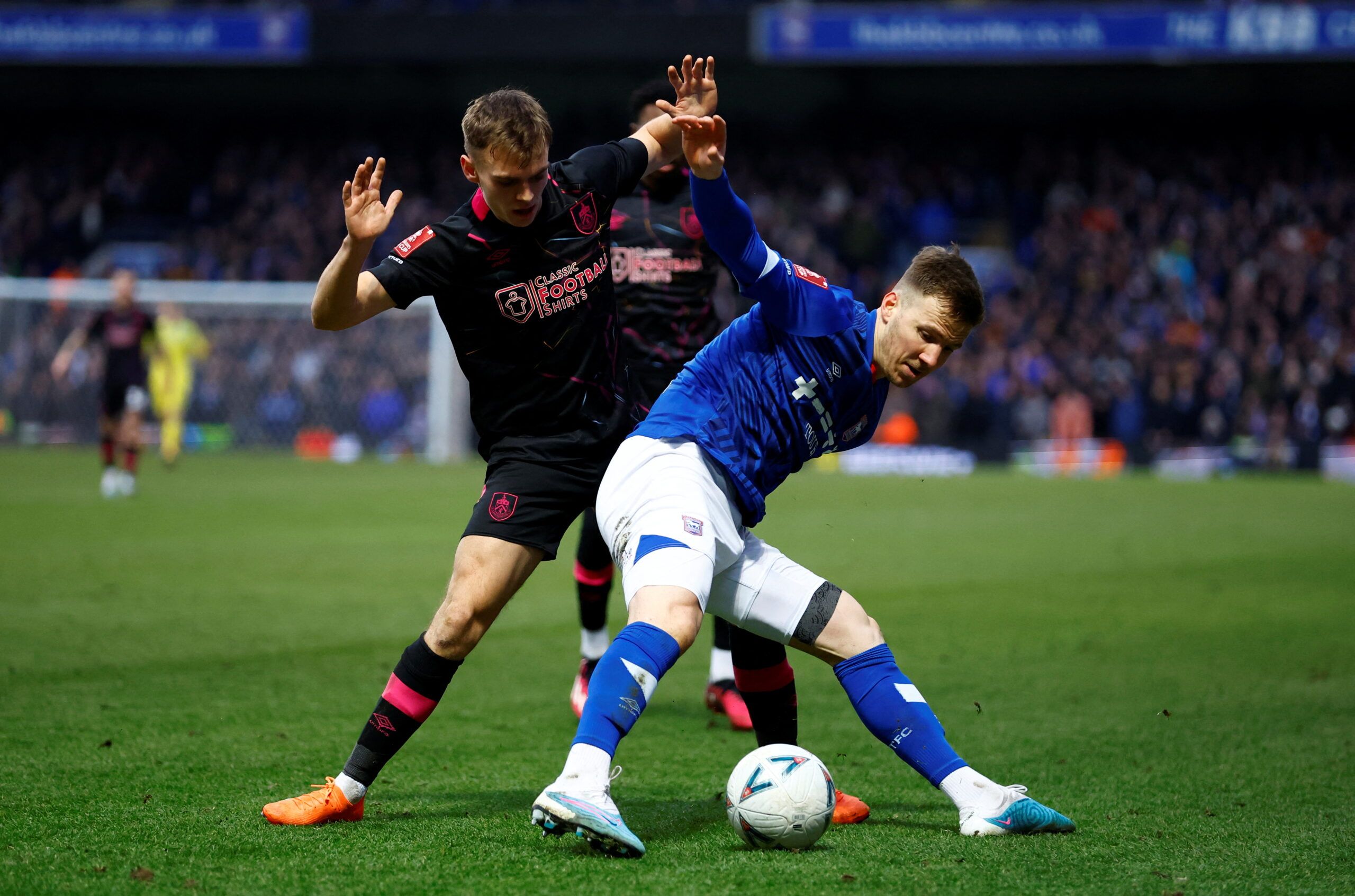 Soccer Football - FA Cup - Fourth Round - Ipswich Town v Burnley - Portman Road, Ipswich, Britain - January 28, 2023 Ipswich Towns Lee Evans in action with Burnleys Scott Twine  Action Images/Peter Cziborra
