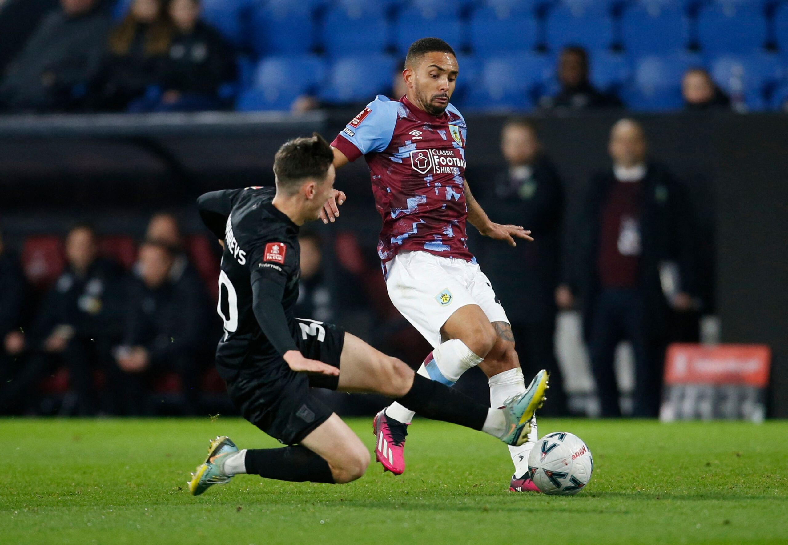 Soccer Football - FA Cup Fourth Round Replay - Burnley v Ipswich Town - Turf Moor, Burnley, Britain - February 7, 2023 Burnley's Vitinho in action with Ipswich Town's Cameron Humphreys Action Images/Ed Sykes