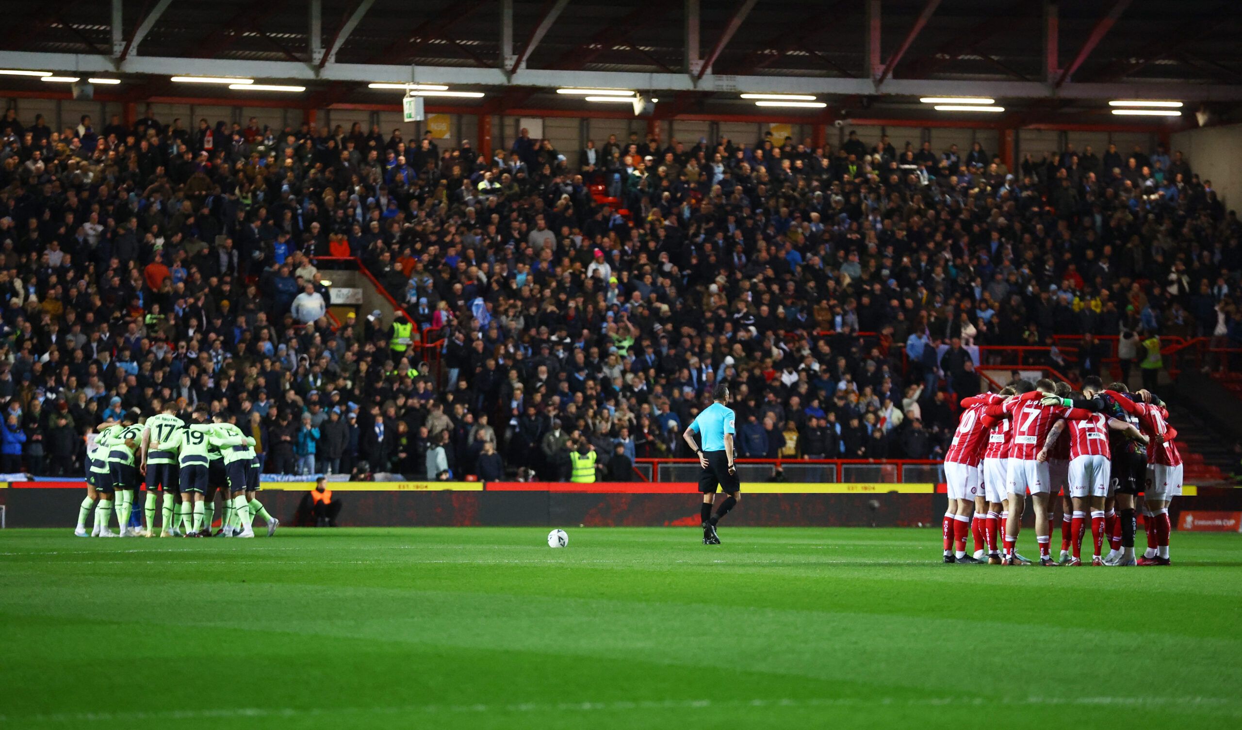 Soccer Football - FA Cup - Fifth Round - Bristol City v Manchester City - Ashton Gate Stadium, Bristol, Britain - February 28, 2023 The teams huddle before the match REUTERS/Hannah Mckay