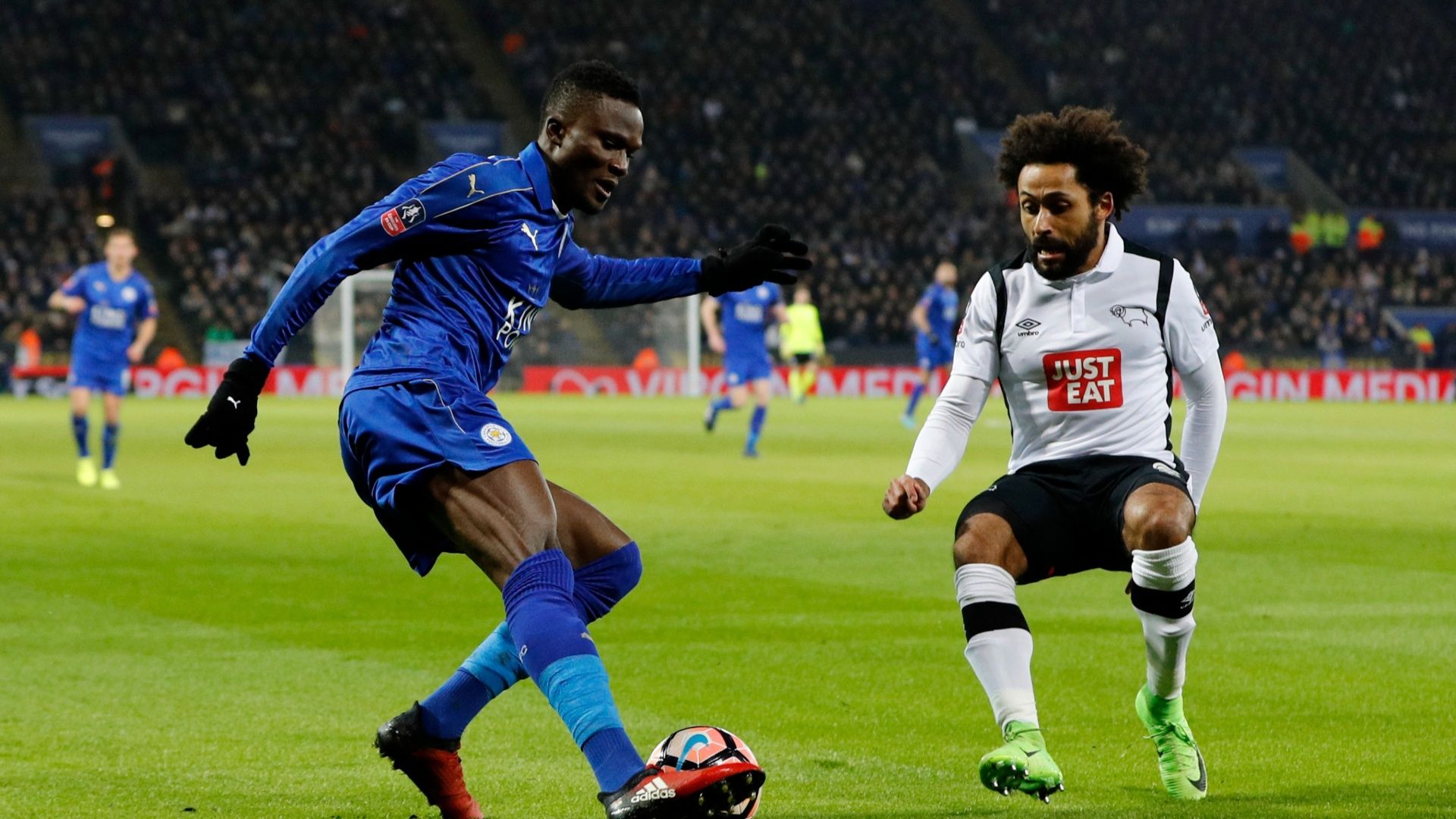Leicester City's Daniel Amartey in action with Derby's Ikechi Anya