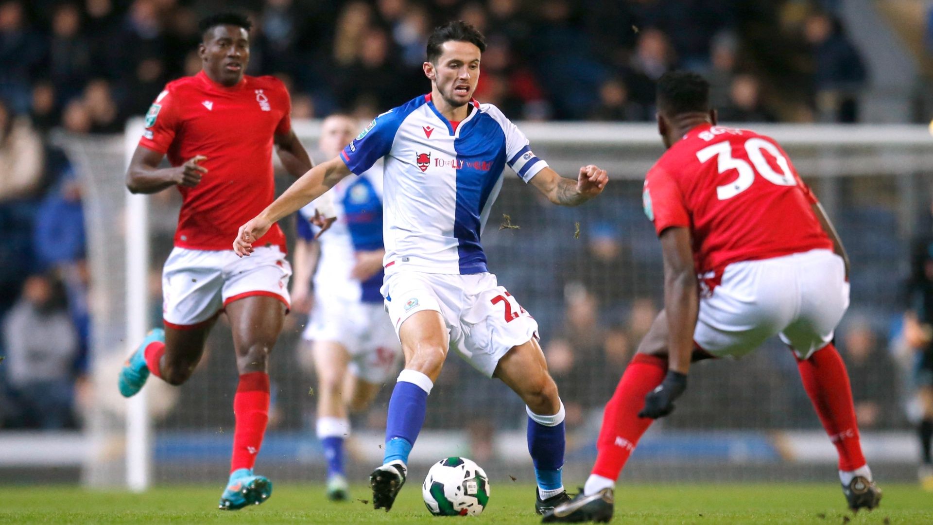 Blackburn Rovers' Lewis Travis competing with Millwall's George News  Photo - Getty Images