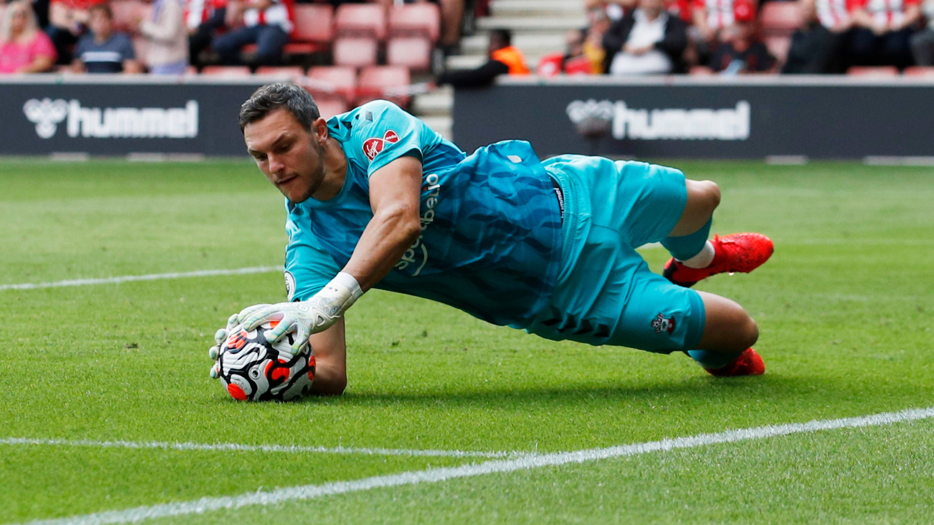 Alex McCarthy diving on ball