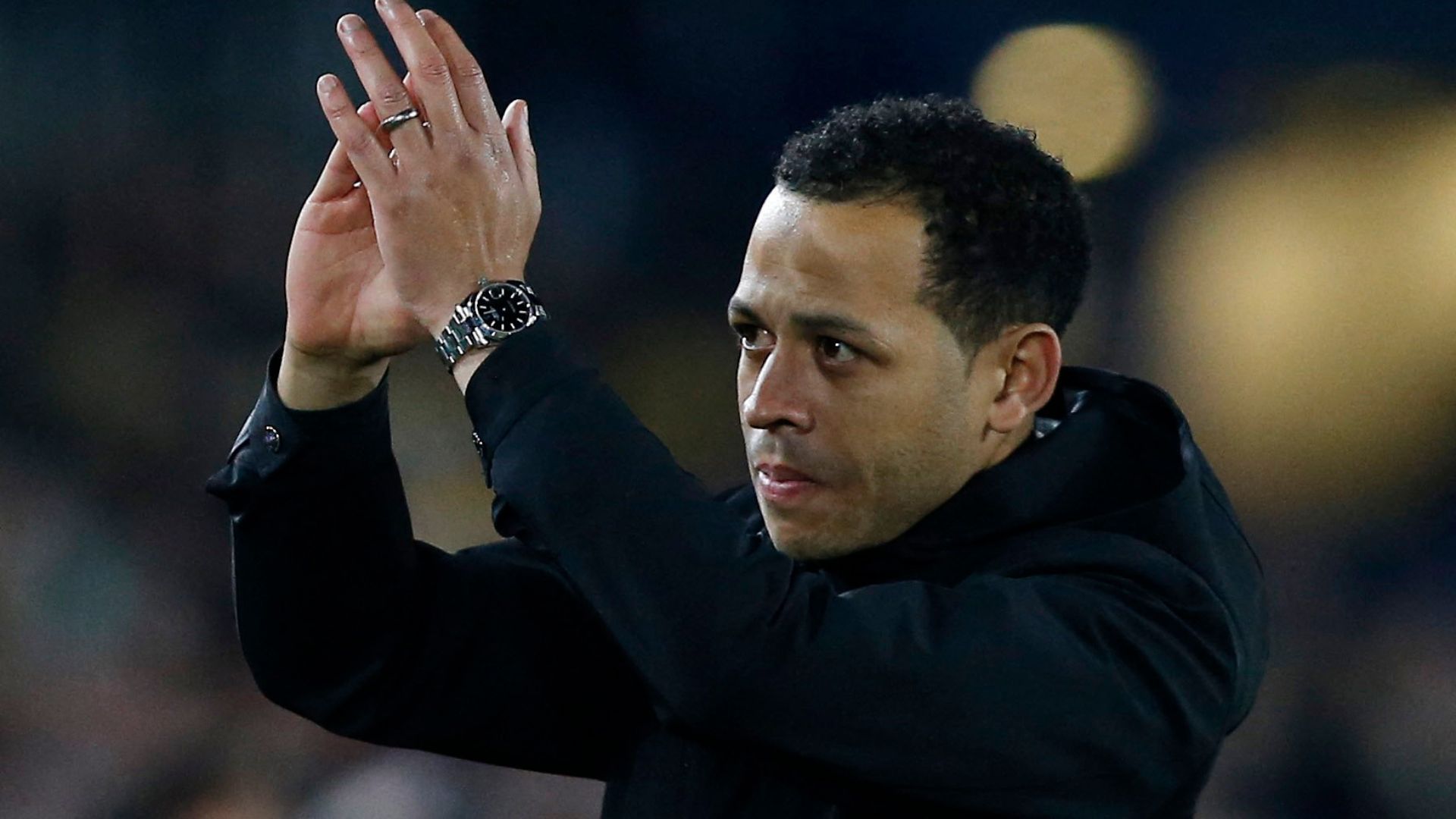 Liam Rosenior applauds the Hull City supporters at Elland Road