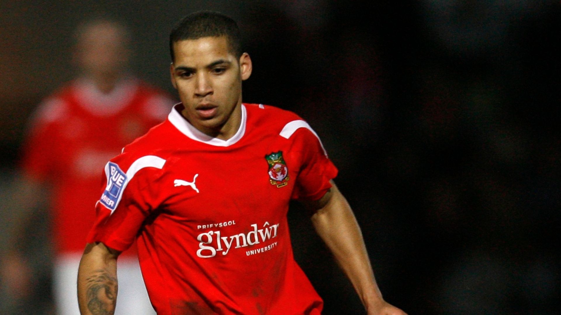 Curtis Obeng playing for Wrexham v Brighton in an FA Cup third round replay